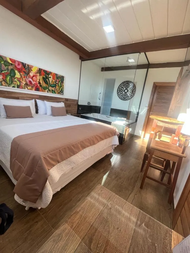 Bed in Pousada Mar Mineiro Macacos