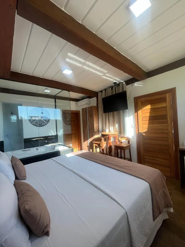 Bed in Pousada Mar Mineiro Macacos