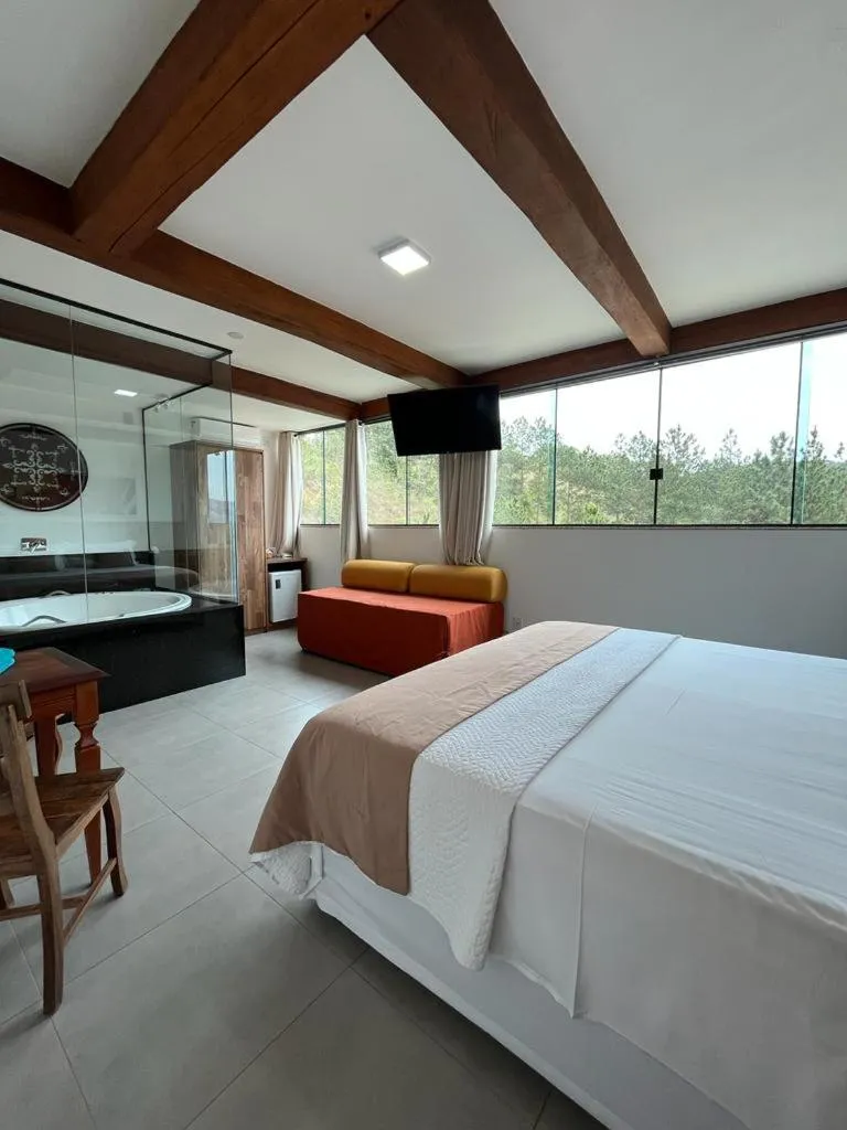 Bed in Pousada Mar Mineiro Macacos