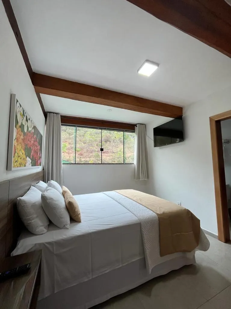 Bed in Pousada Mar Mineiro Macacos