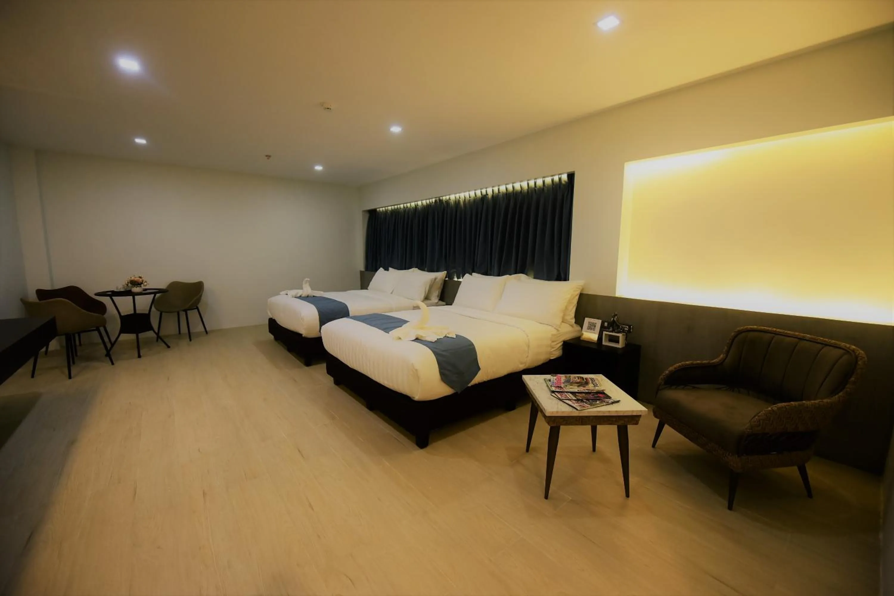 Photo of the whole room, Bed in The First Islatel