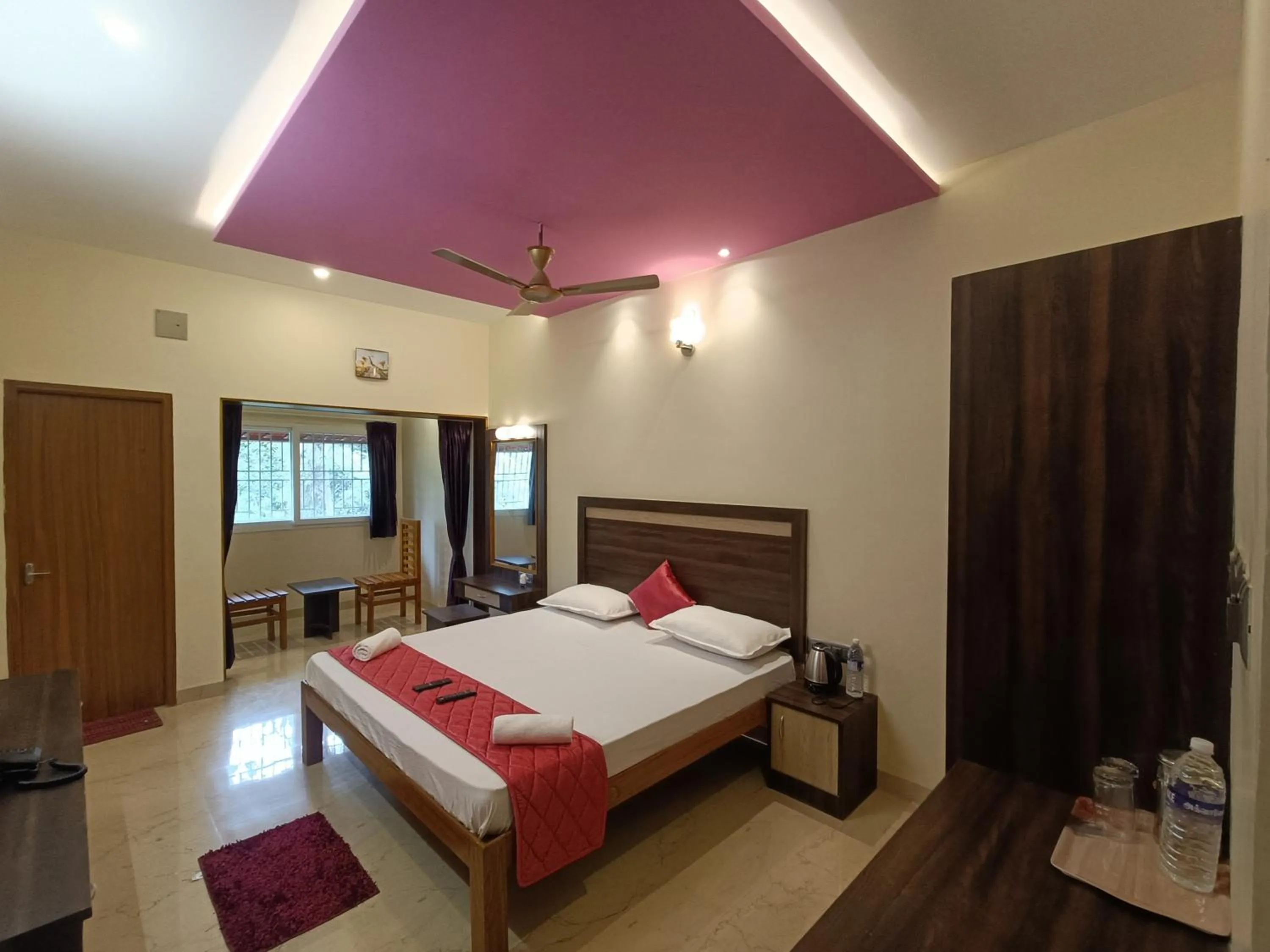 Photo of the whole room, Bed in Bhavan Resorts