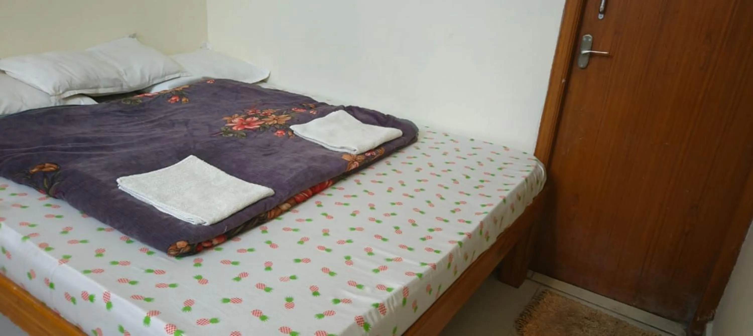 Bed in Bhavan Resorts