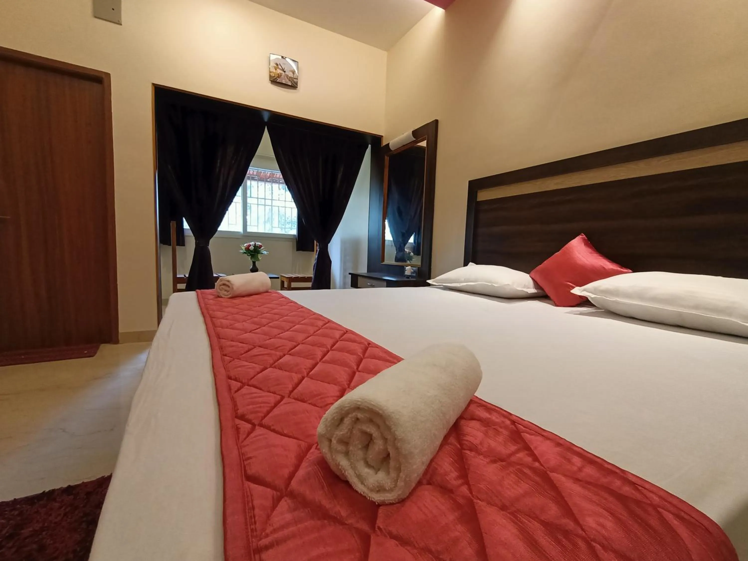 Bed in Bhavan Resorts