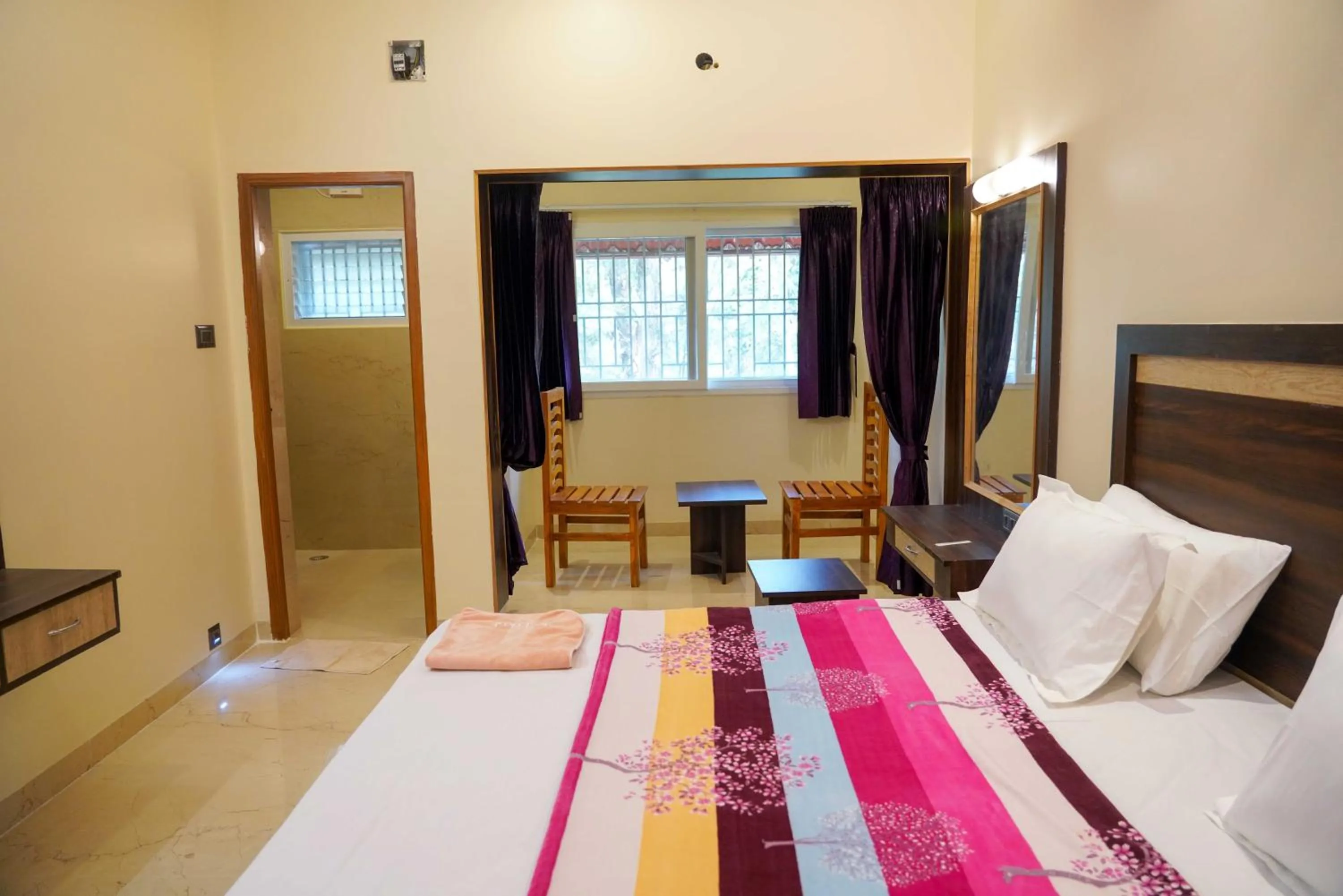 Bed in Bhavan Resorts