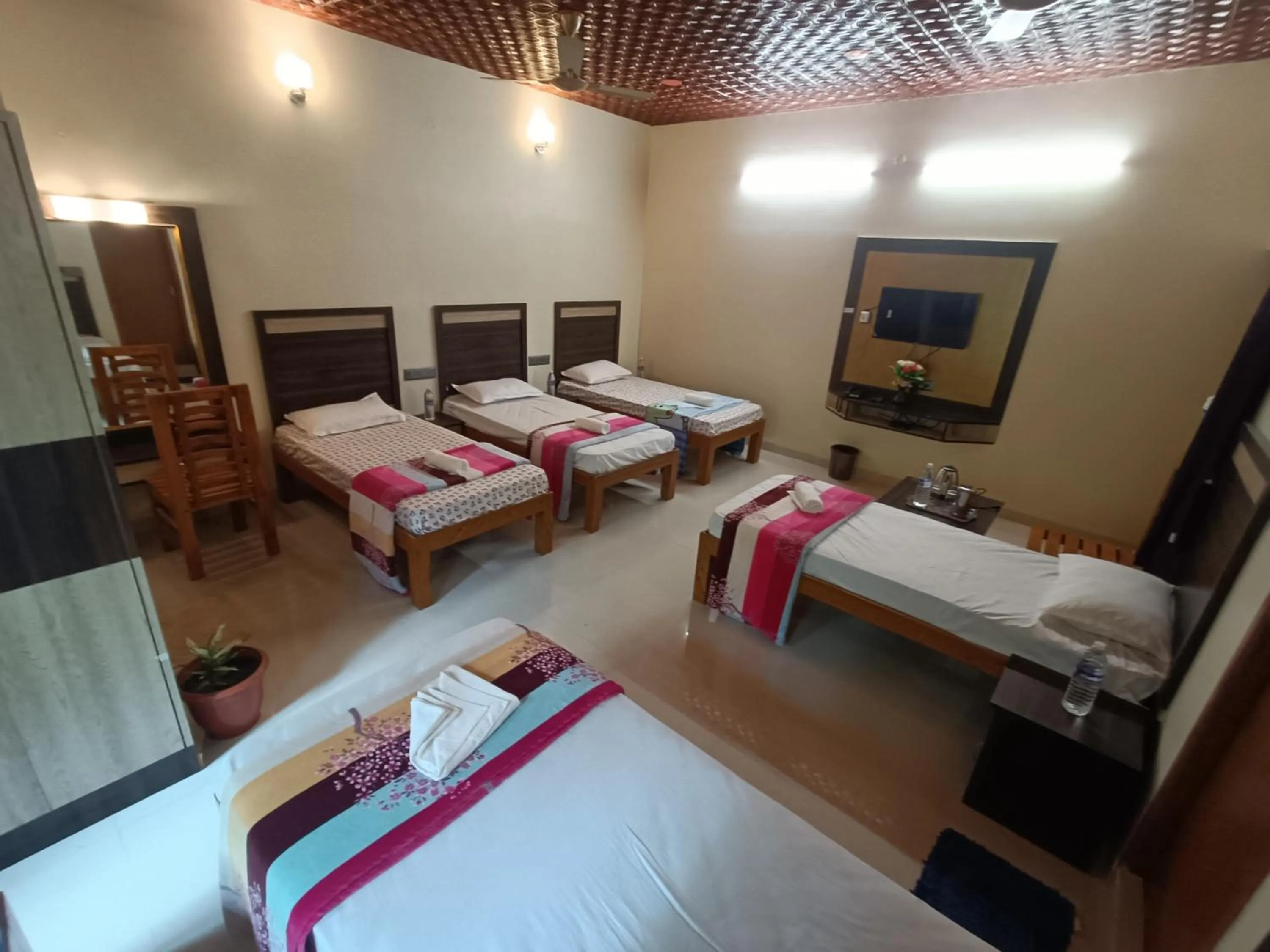 Photo of the whole room, Bed in Bhavan Resorts