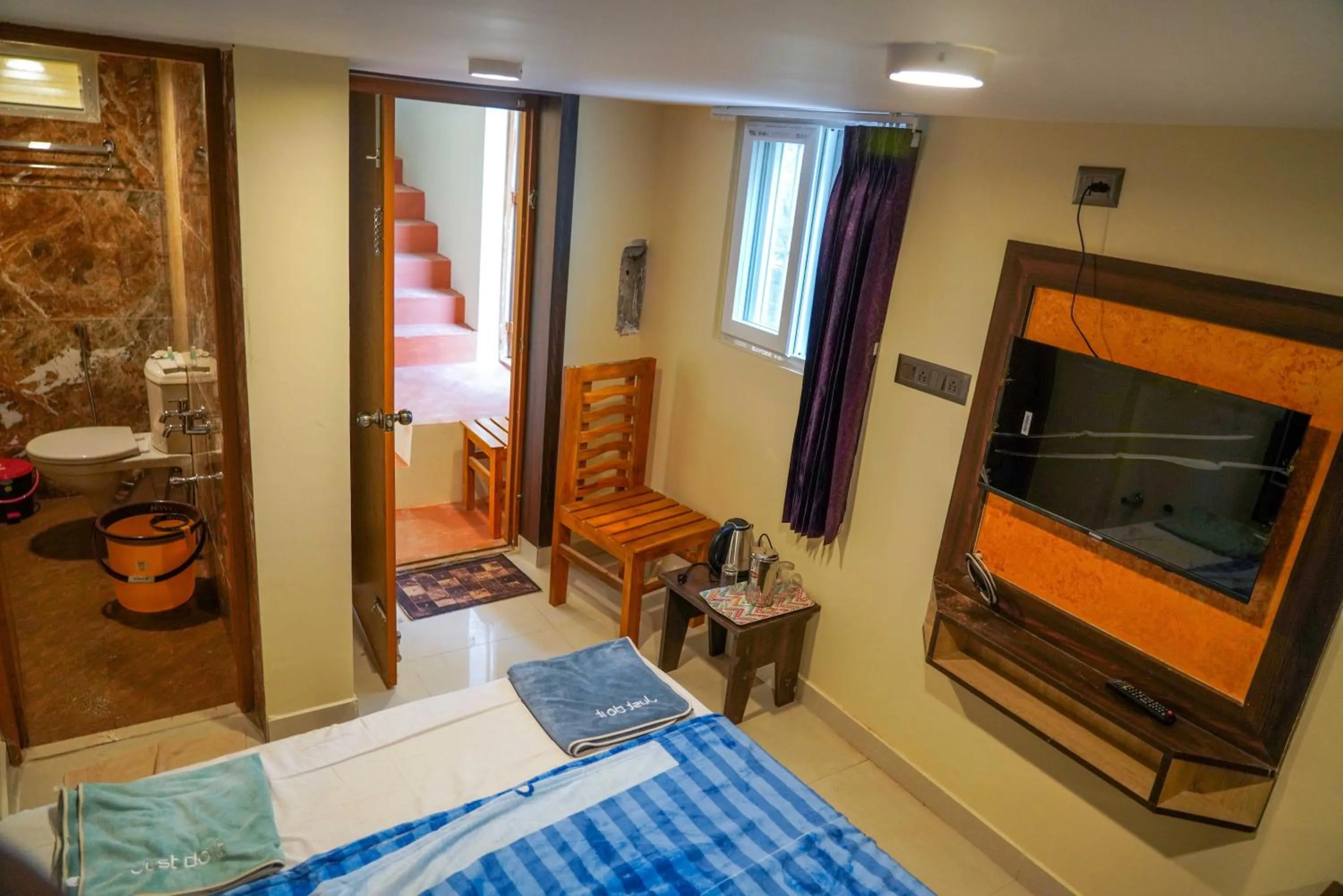 Bathroom, Bed in Bhavan Resorts