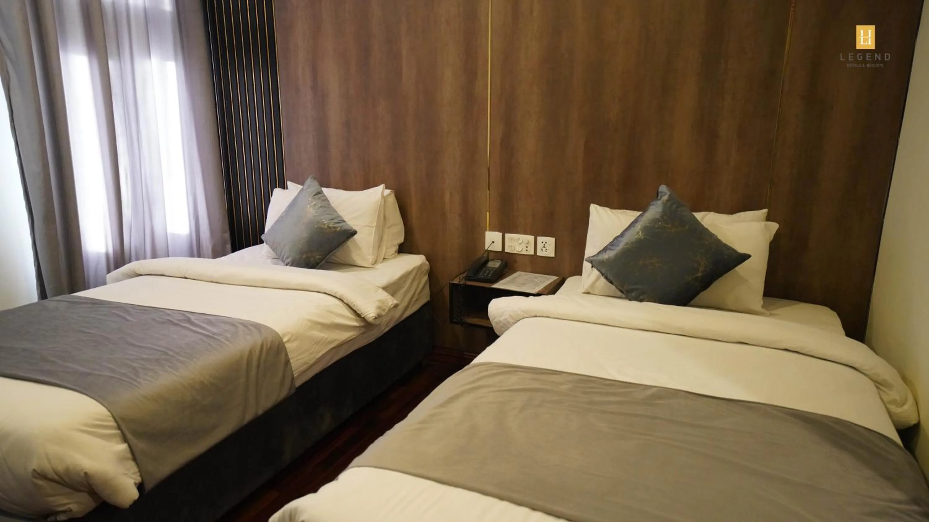 Bed in Legend Hotel Skardu