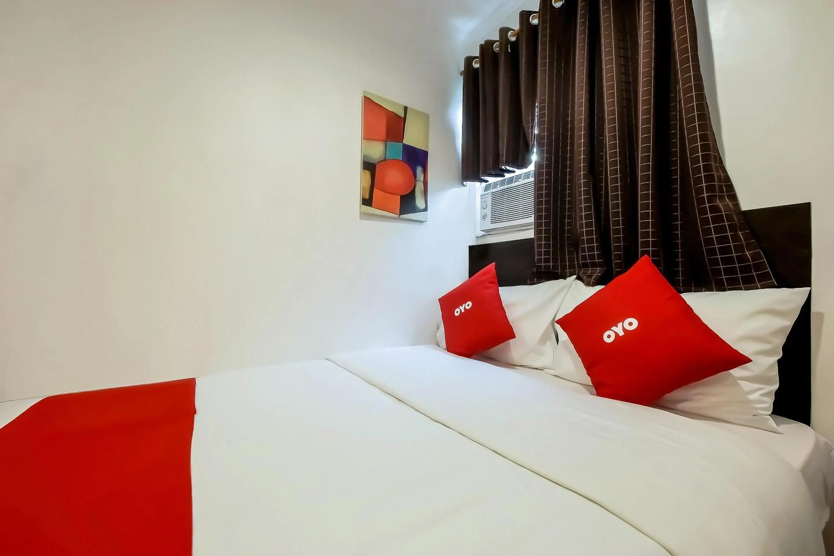 Bedroom in Super OYO 856 City Stay Inns Slex Makati