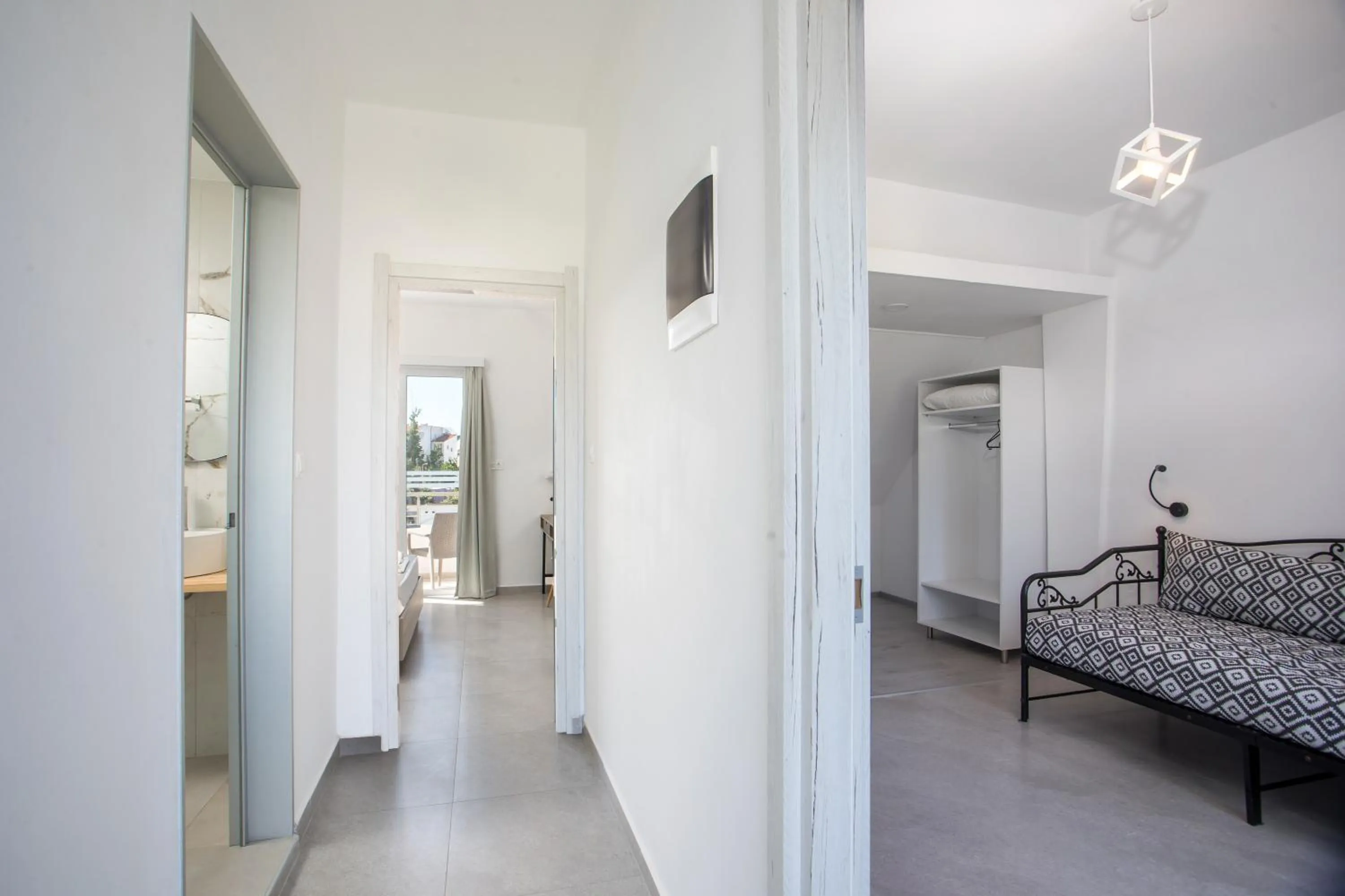 Seating area, Bed in Mando Living -Faliraki