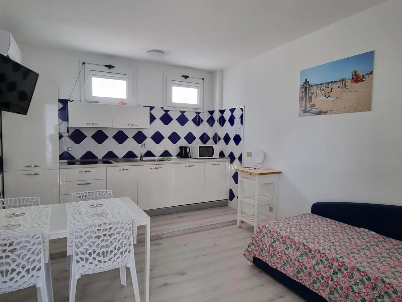 Kitchen or kitchenette, Bed in Appart-Hotel Holiday