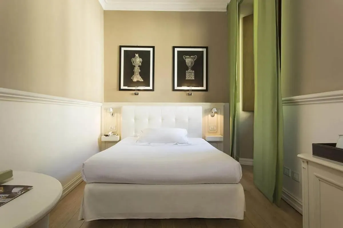 Bed in Grand Hotel Cavour