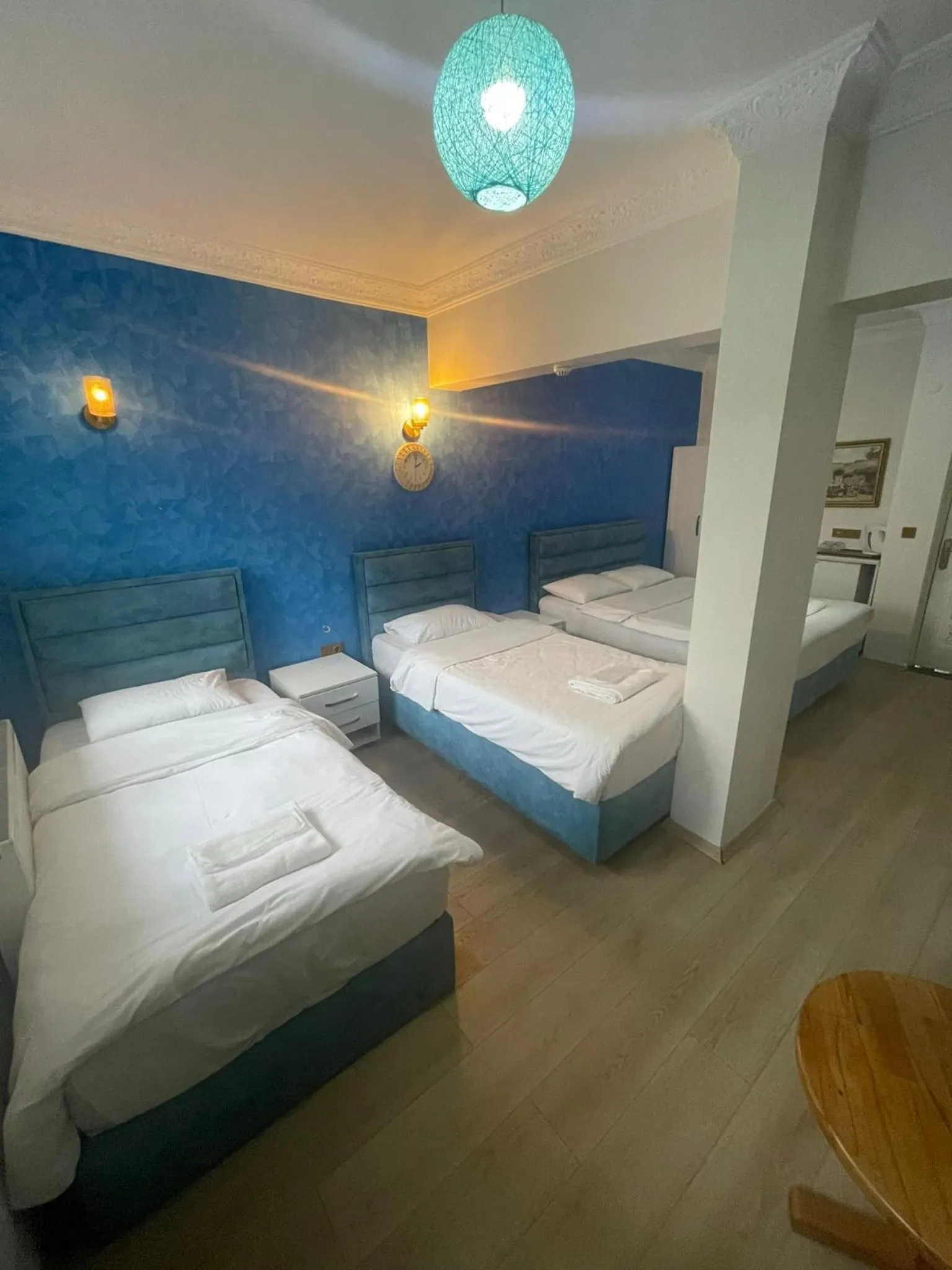 Bed in AVRASYAQUEEN HOTEL