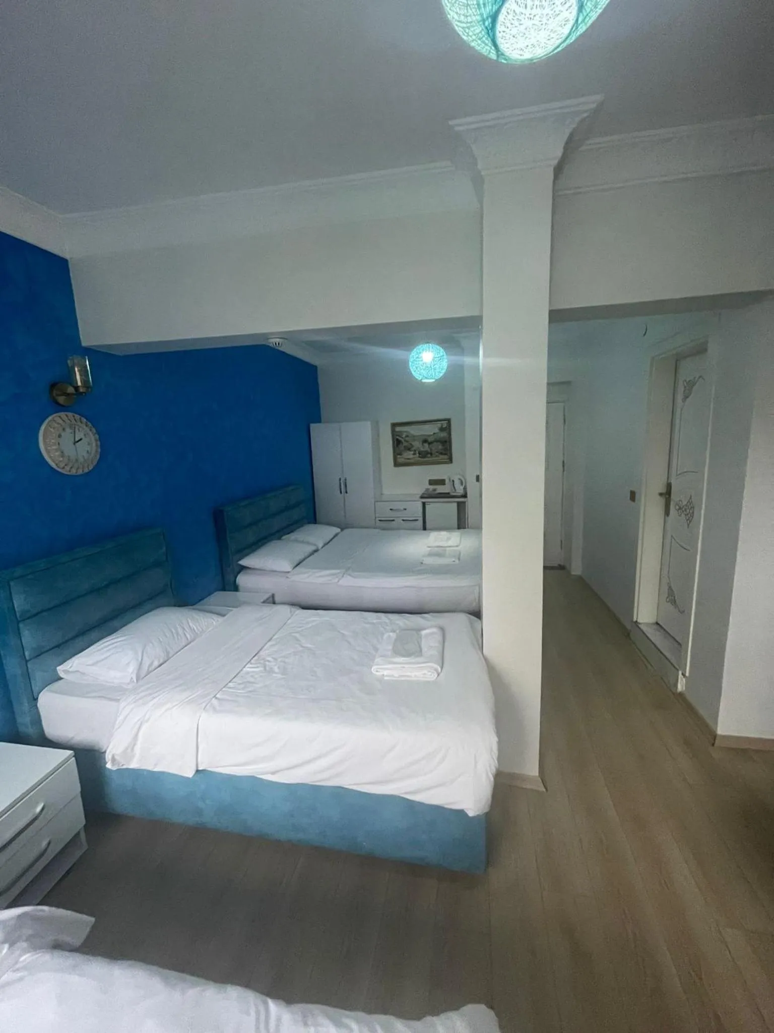 Bed in AVRASYAQUEEN HOTEL