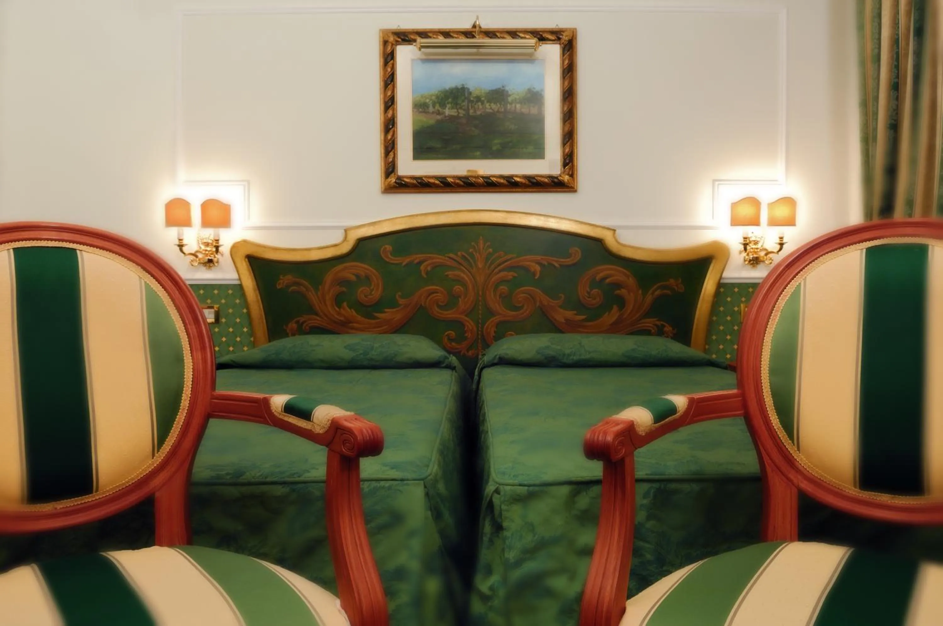 Bed, Seating Area in Hotel Giulio Cesare