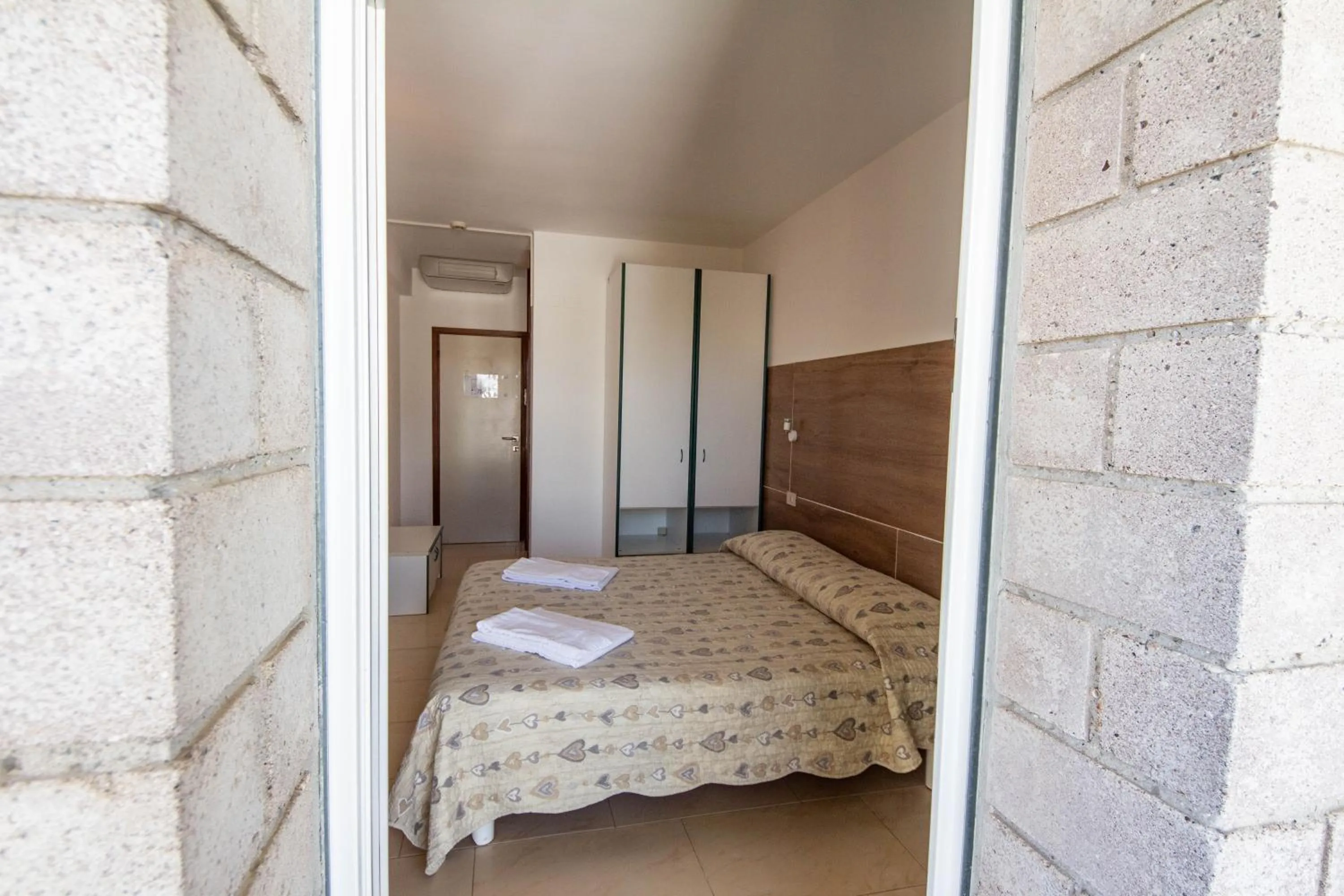 Bedroom in Hotel Ambra