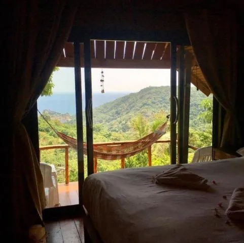 Bed in Tree House Bungalows Koh Tao