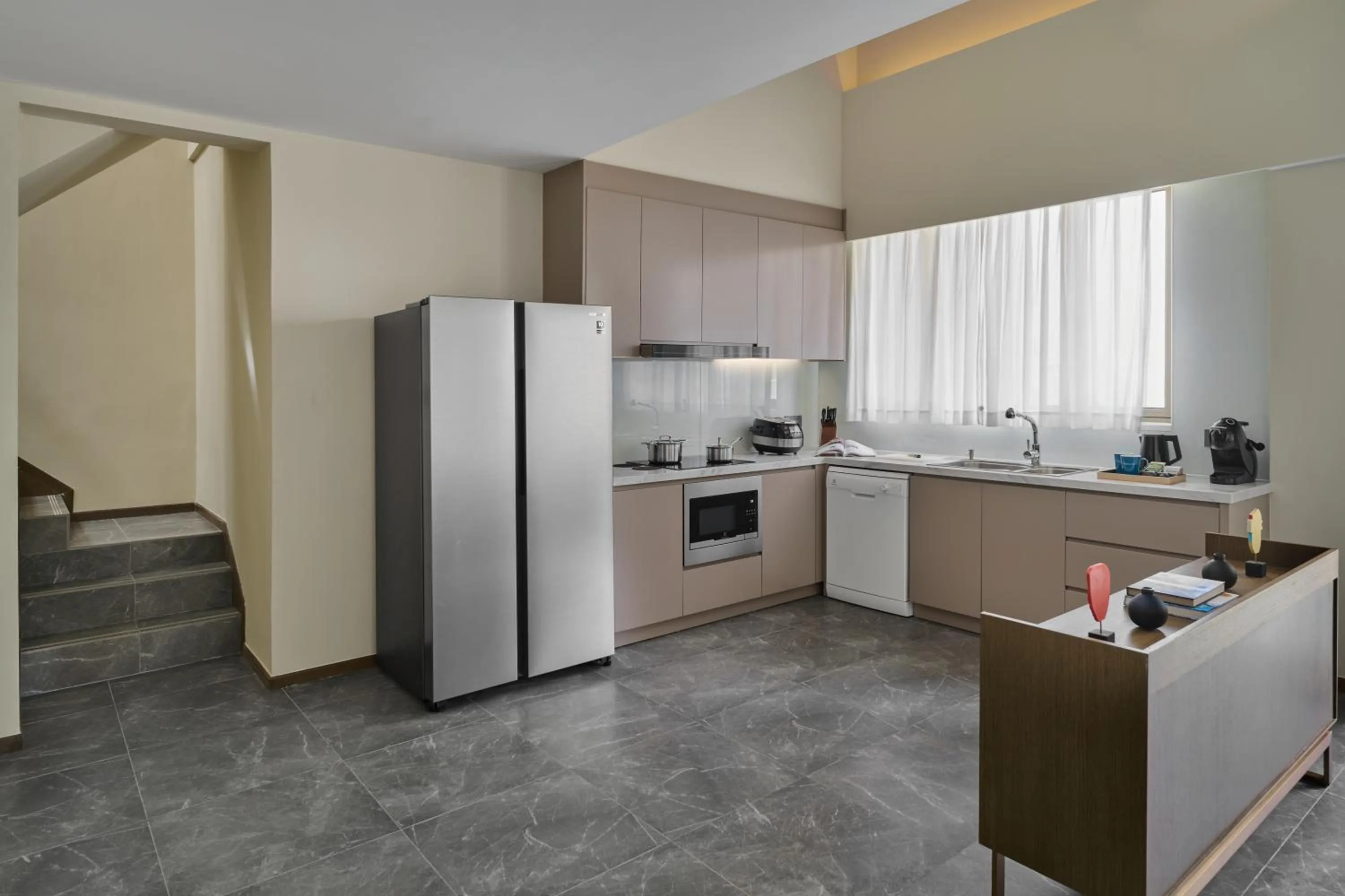Kitchen or kitchenette in Oakwood Premier Phnom Penh