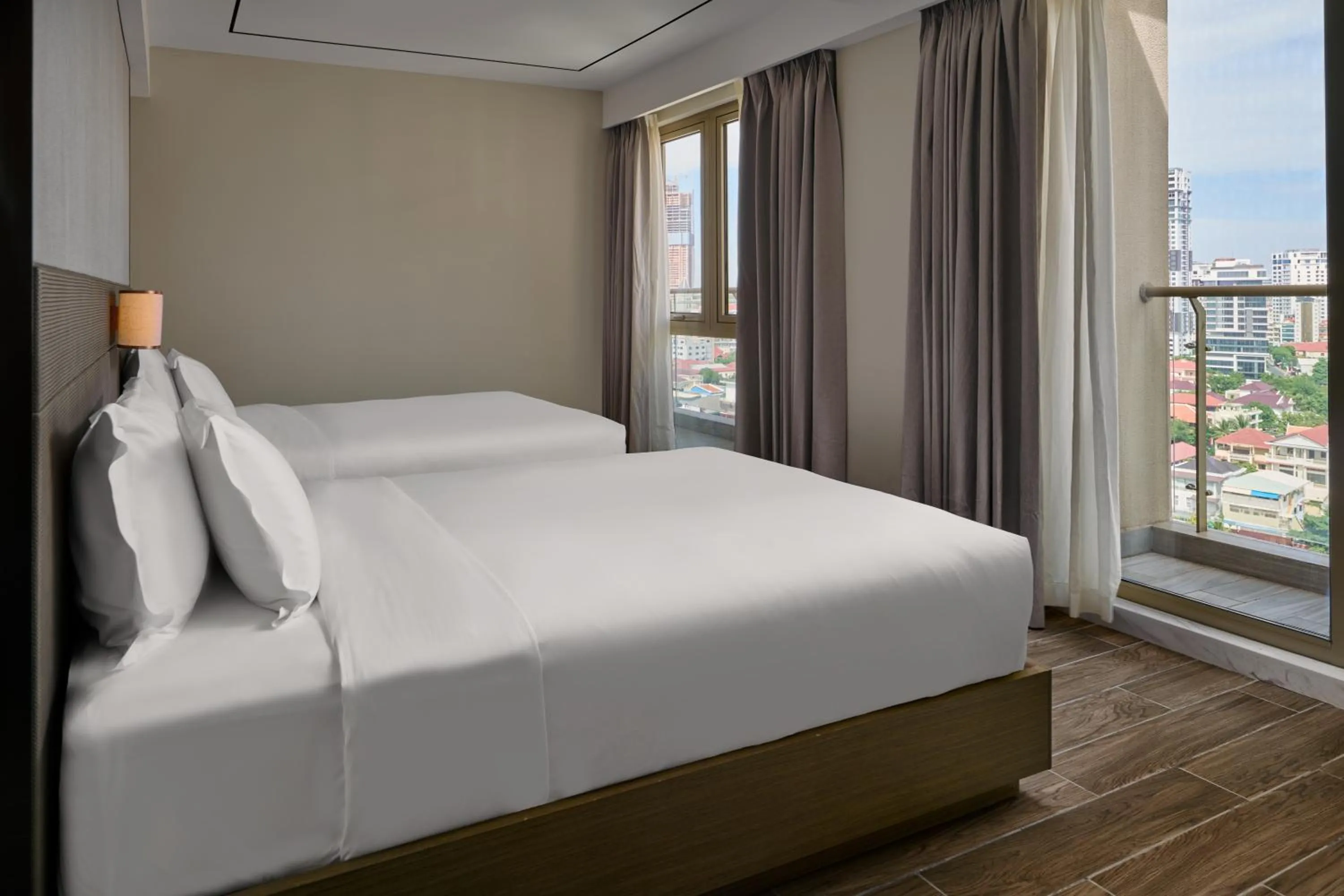 View (from property/room), Bed in Oakwood Premier Phnom Penh