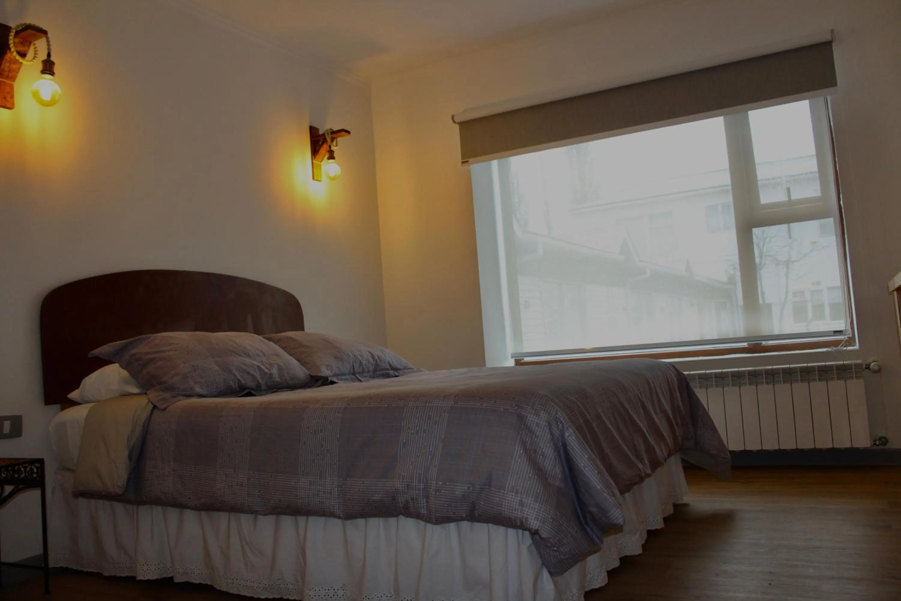 Bed in Hostal Alamo Patagonico