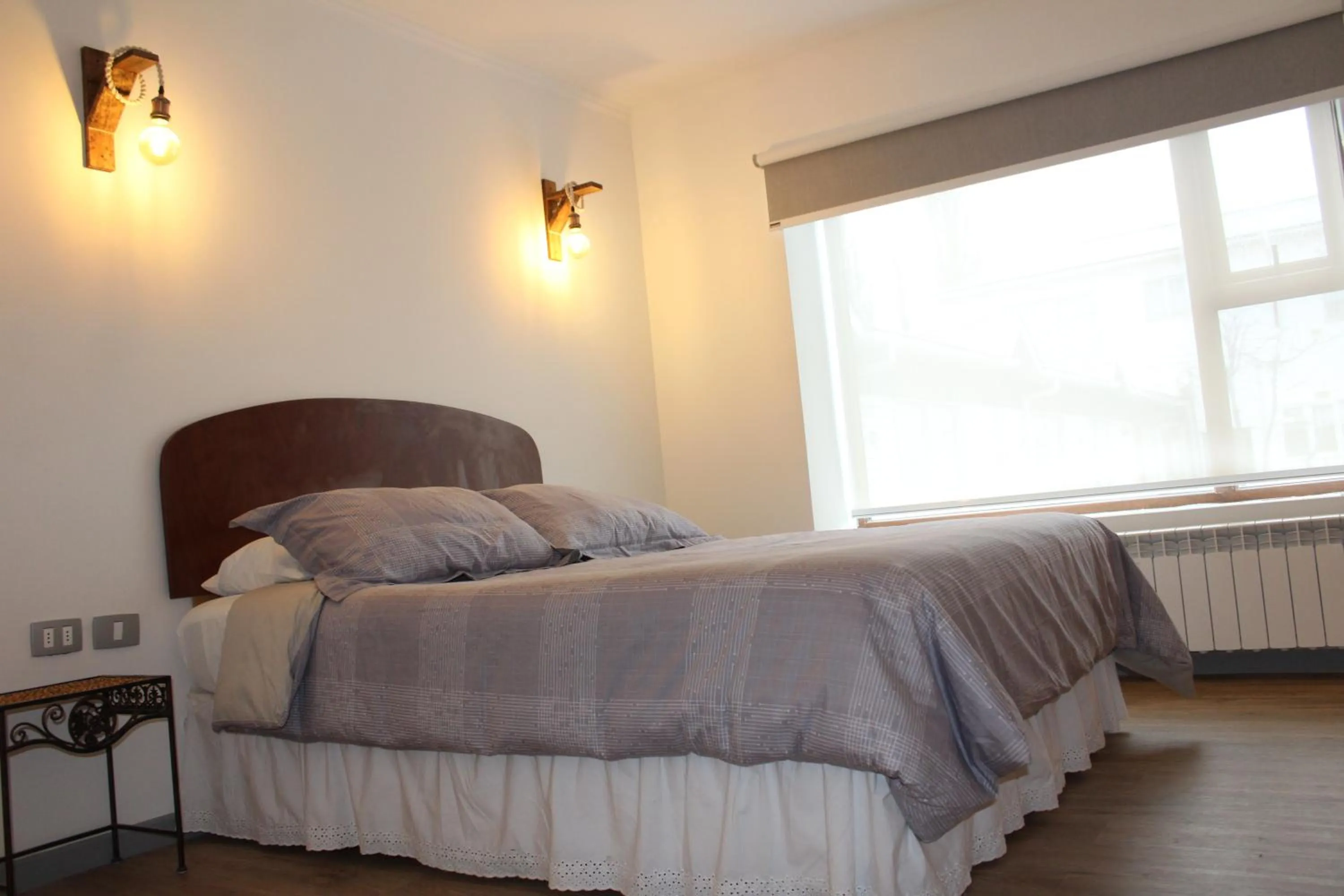 Bed in Hostal Alamo Patagonico