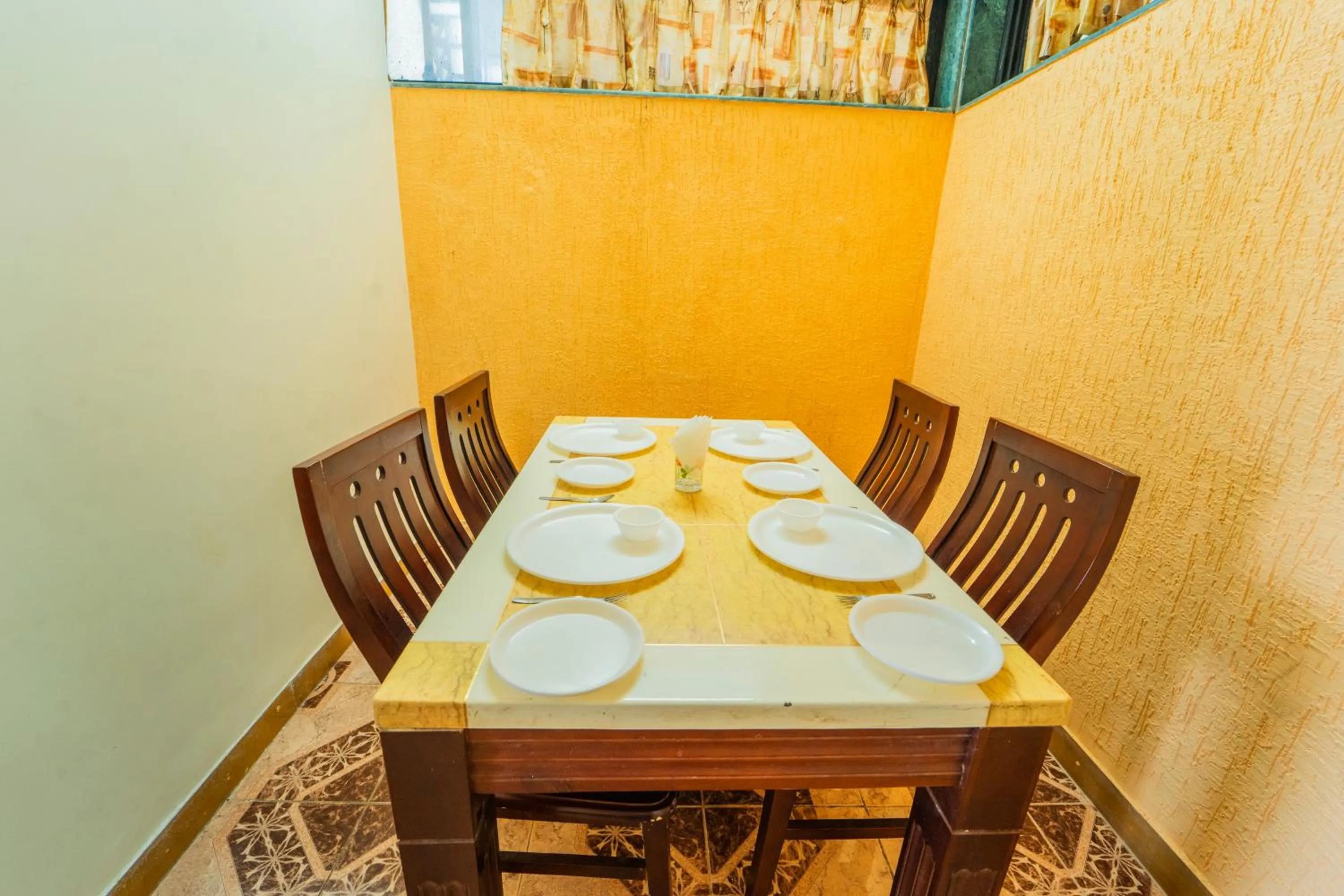 Dining area in Sharayu Holidays Valley View