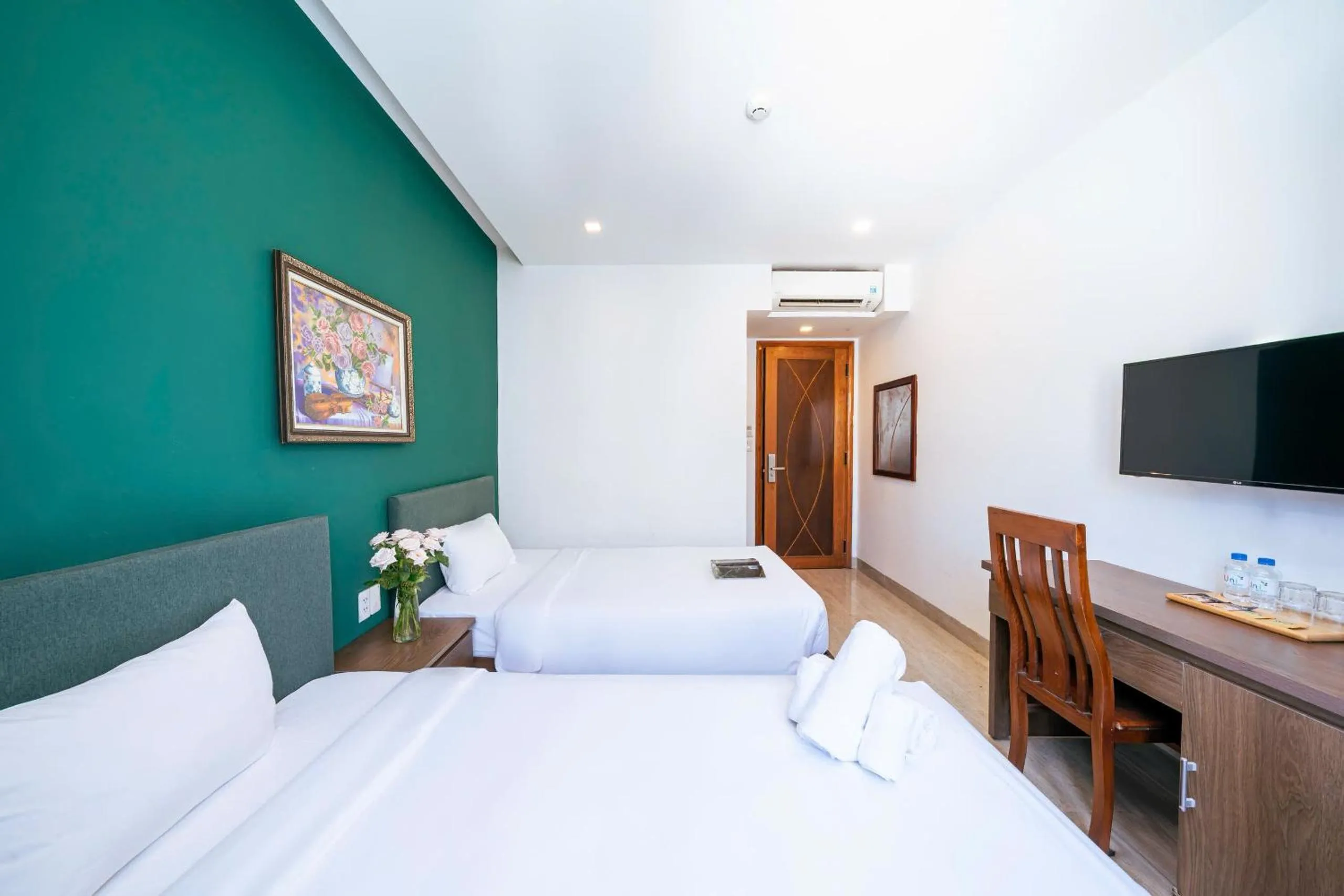 TV and multimedia, Bed in Ocean Garden Boutique Da Nang by Haviland
