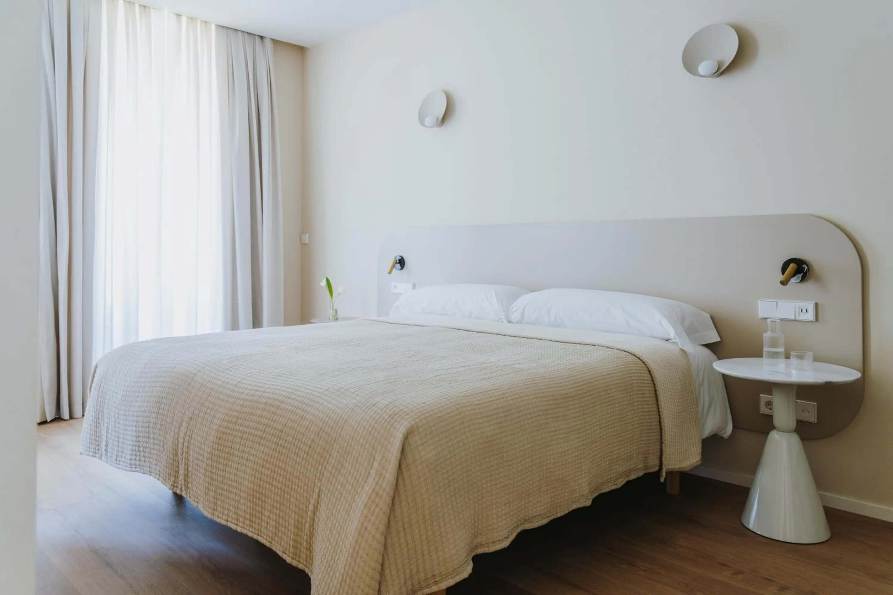 Bed in The Passage Apartments