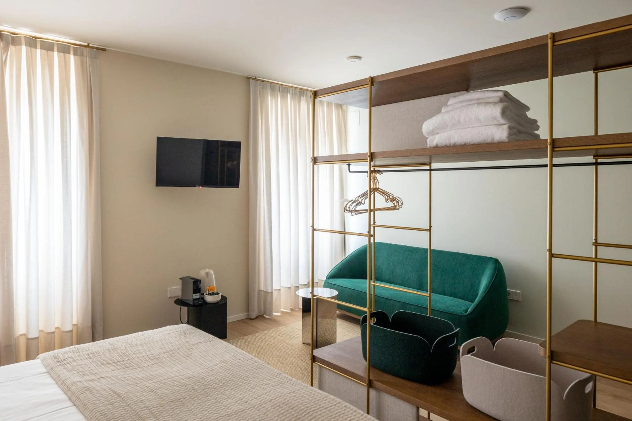 Photo of the whole room, Bed in The Passage Apartments