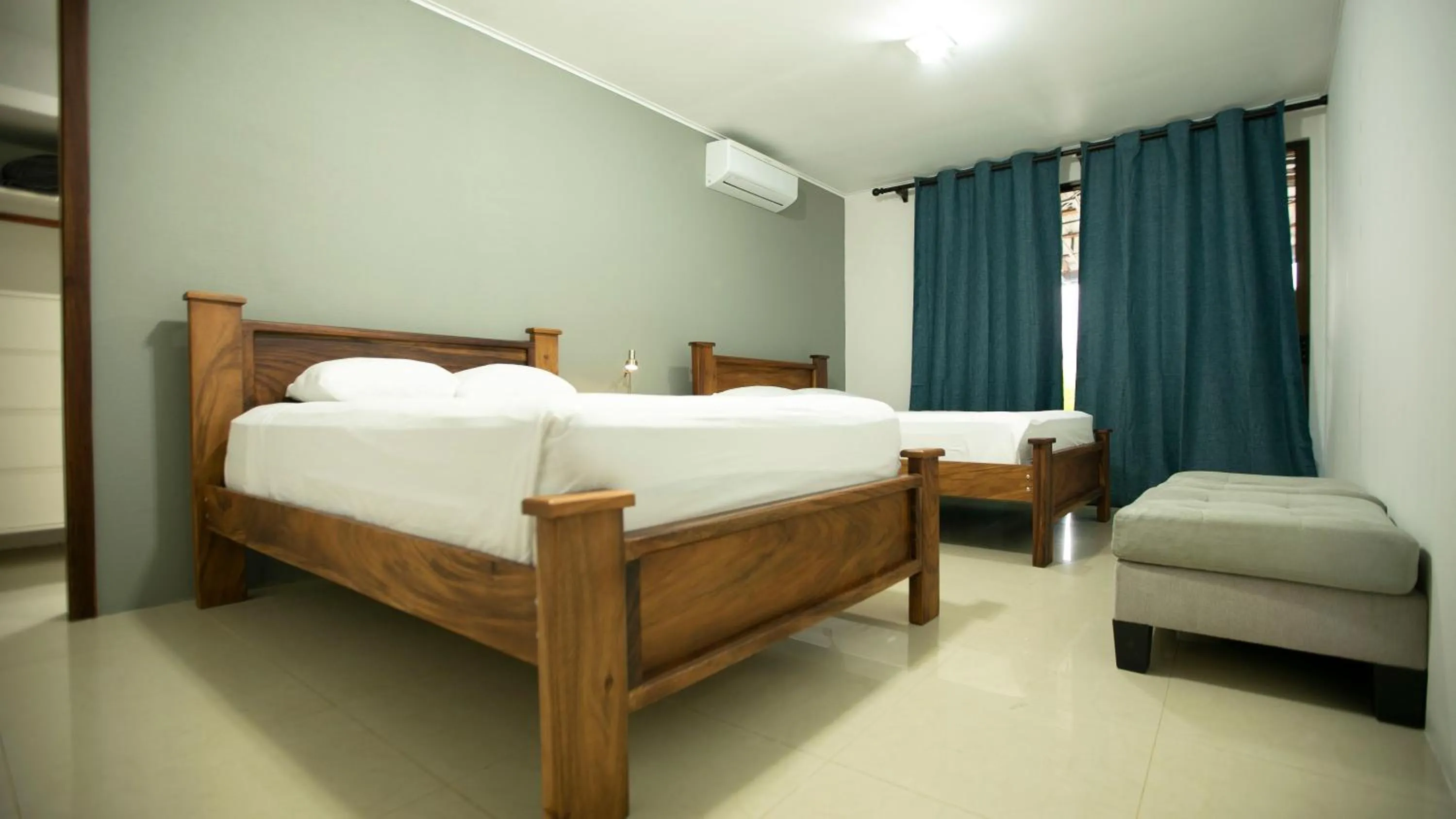 Bed in Coati Arenal Lodge