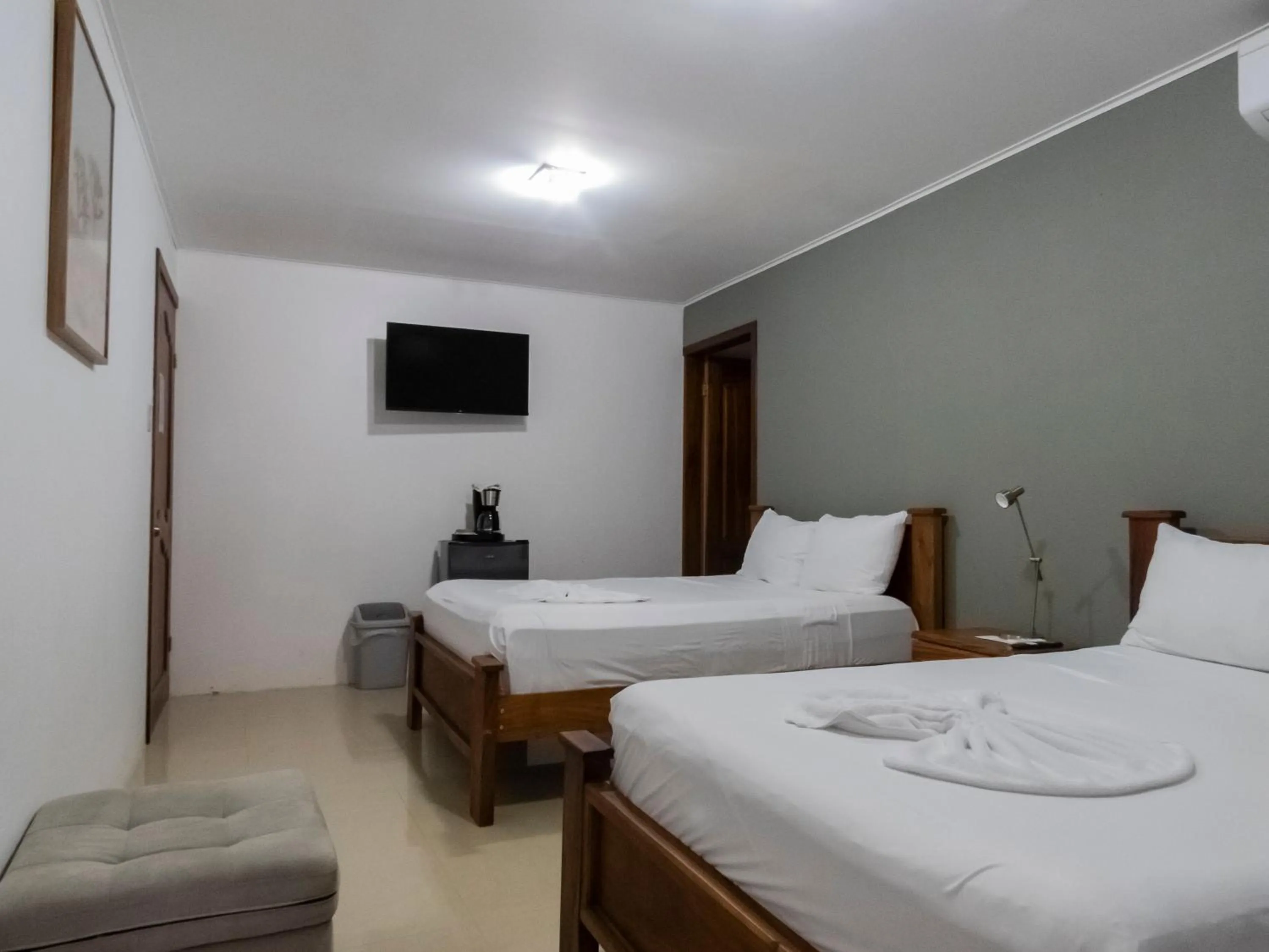 Bed in Coati Arenal Lodge