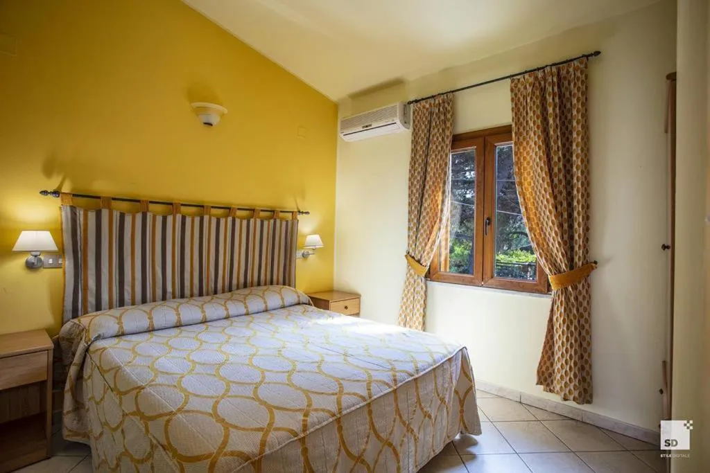 Bed in Tonicello Hotel Resort & SPA