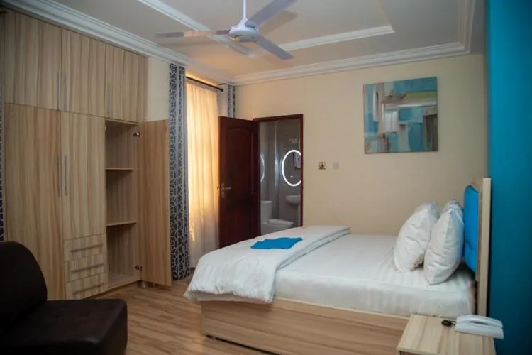 Bed in Macoba Luxury Apartments