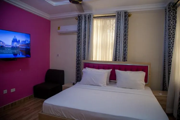 Bed in Macoba Luxury Apartments