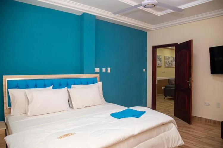 Bed in Macoba Luxury Apartments