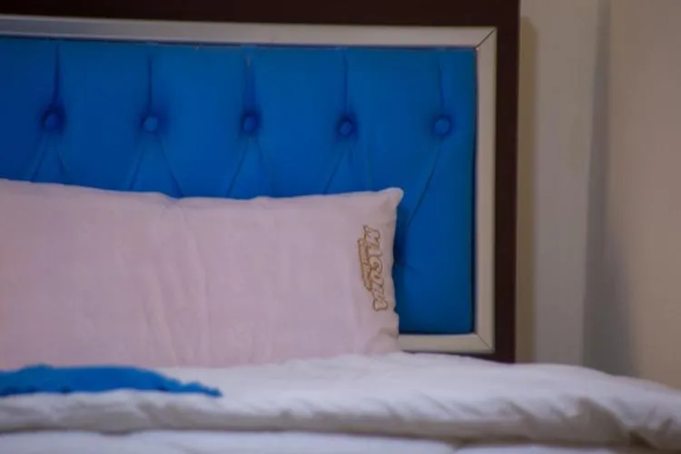 Bed in Macoba Luxury Apartments