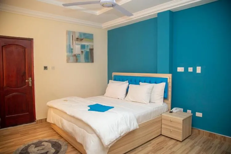 Bed in Macoba Luxury Apartments