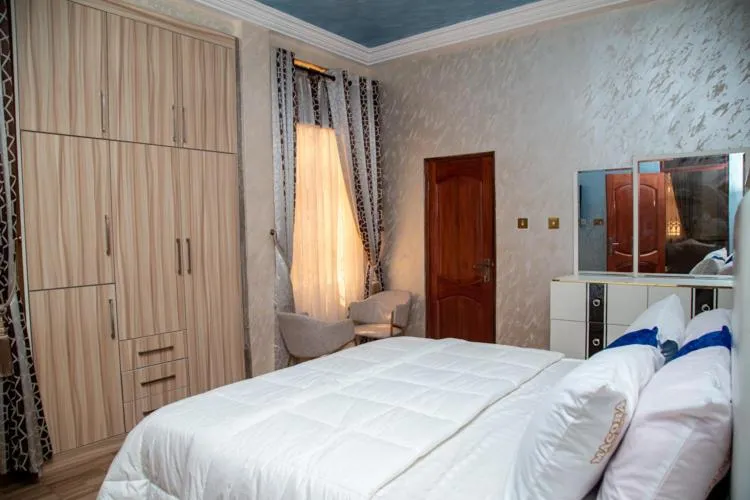 Bed in Macoba Luxury Apartments