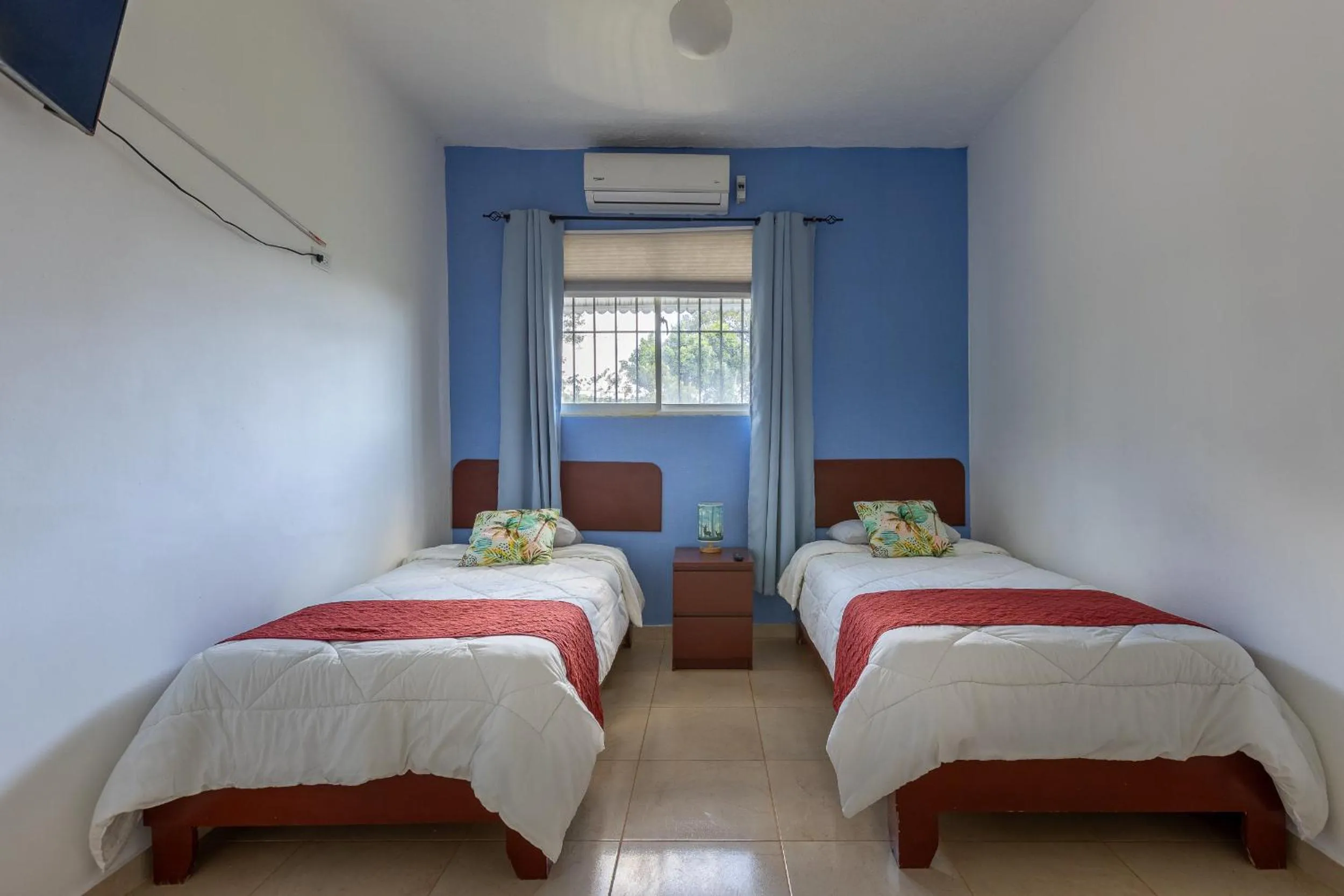 Bed in EDMA APARTAHOTEL