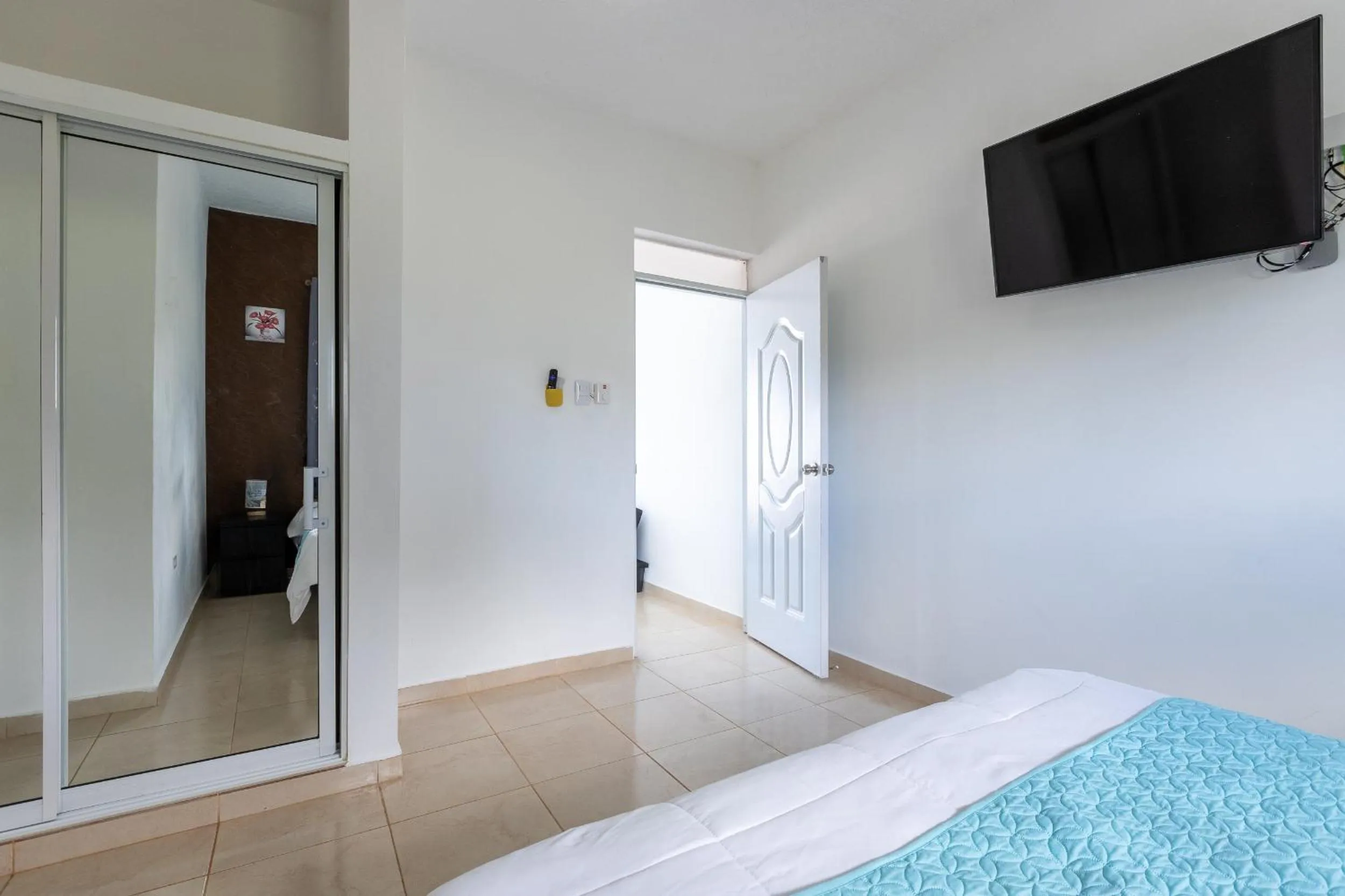 Bed in EDMA APARTAHOTEL