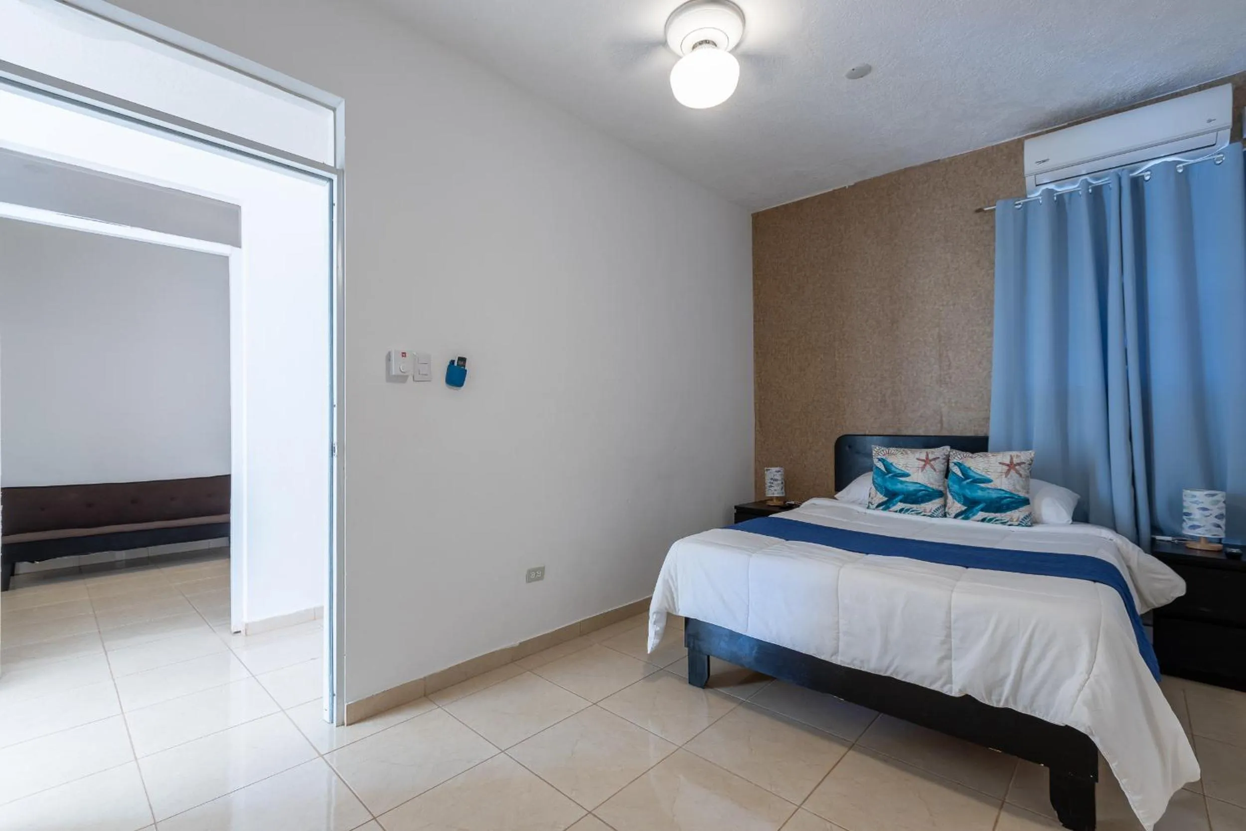 Bed in EDMA APARTAHOTEL