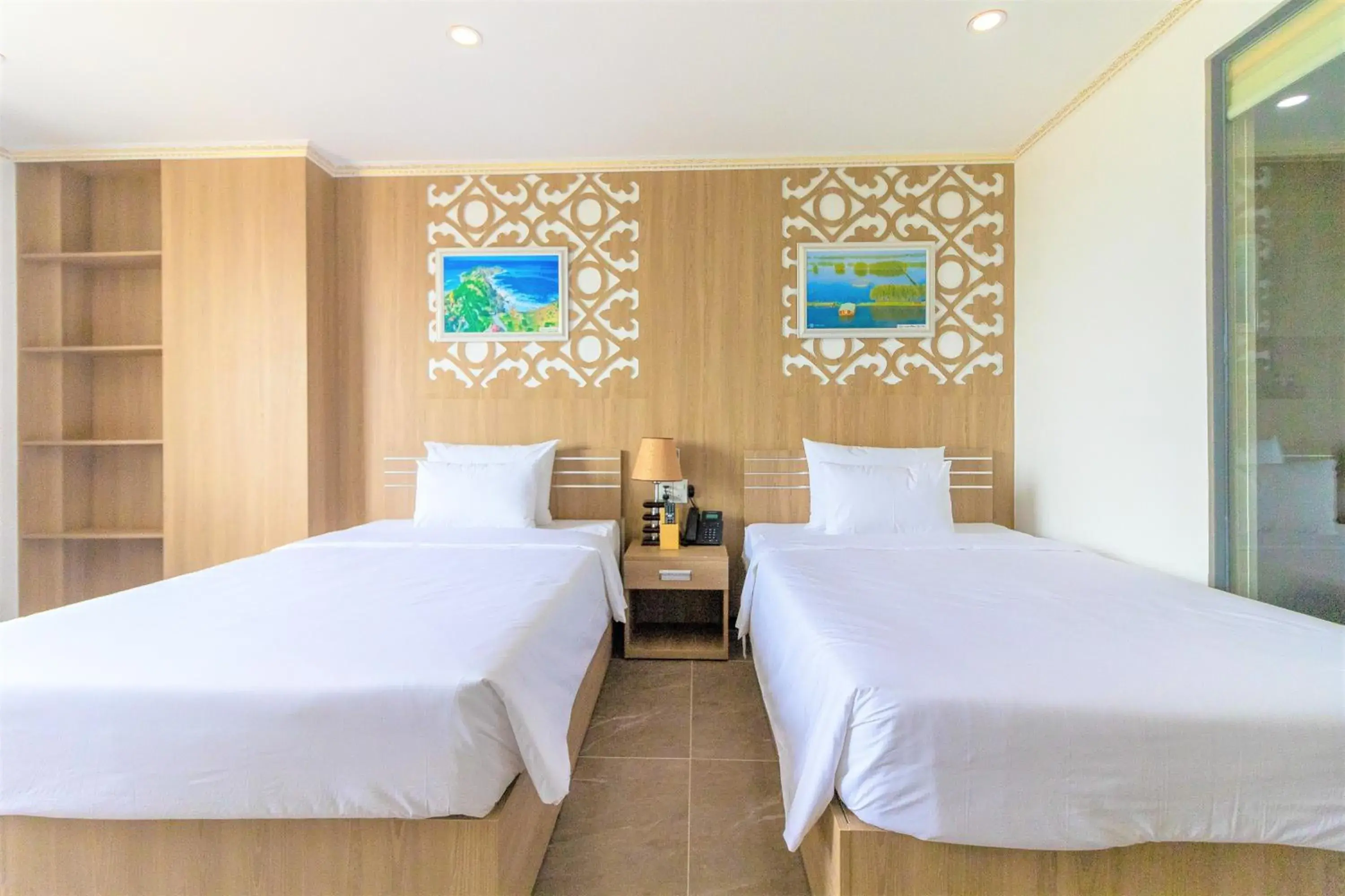 Deluxe Twin Room with City View in Pearl Beach Hotel Quy Nhon Deluxe Twin Room with City View in Pearl Beach Hotel Quy Nhon