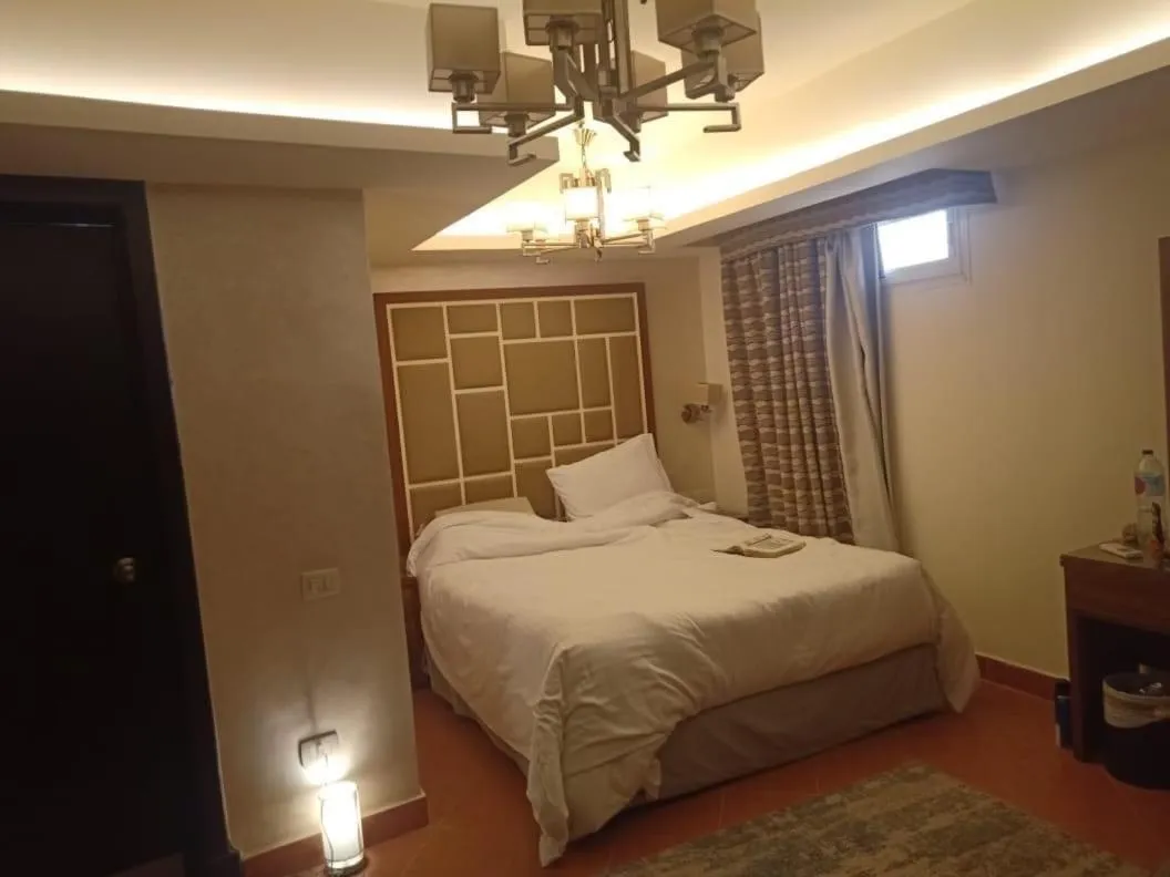 Bed in Amazing sea view Penthouse Apartment in Pyramids Porto El-Sokhna