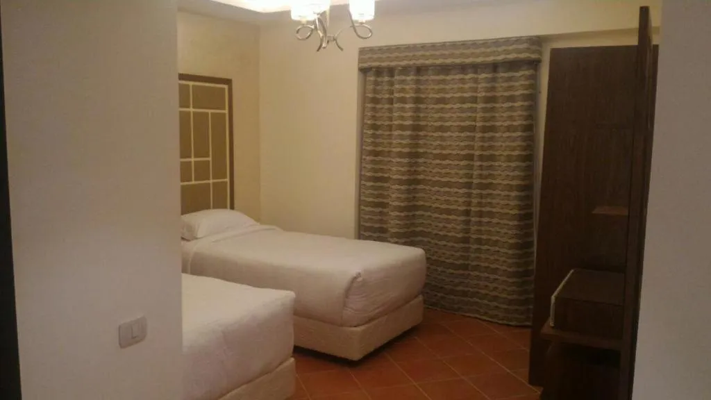 Bed in Amazing sea view Penthouse Apartment in Pyramids Porto El-Sokhna