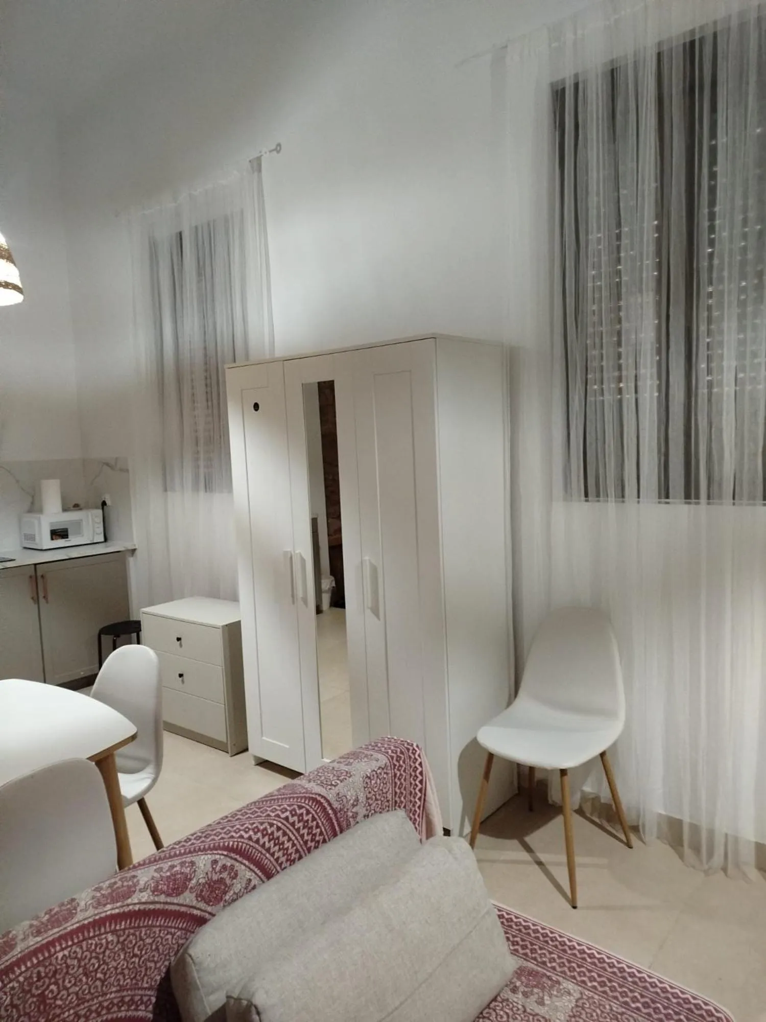 wardrobe, Bed in Soho Boho Apartments - with sunny rooftop terrace and fiber optic internet