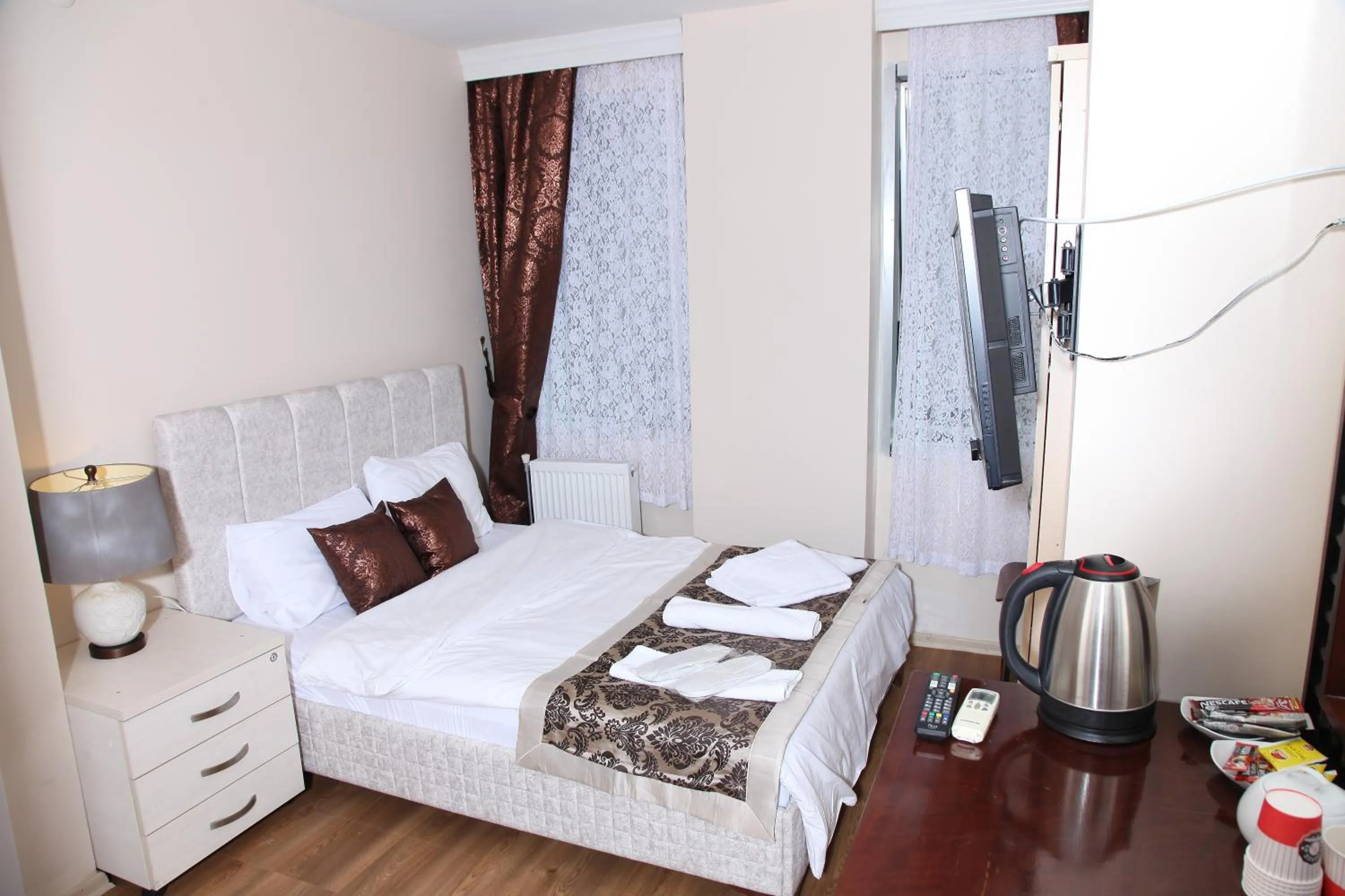 Bed in Çamlıca Tower Hotel