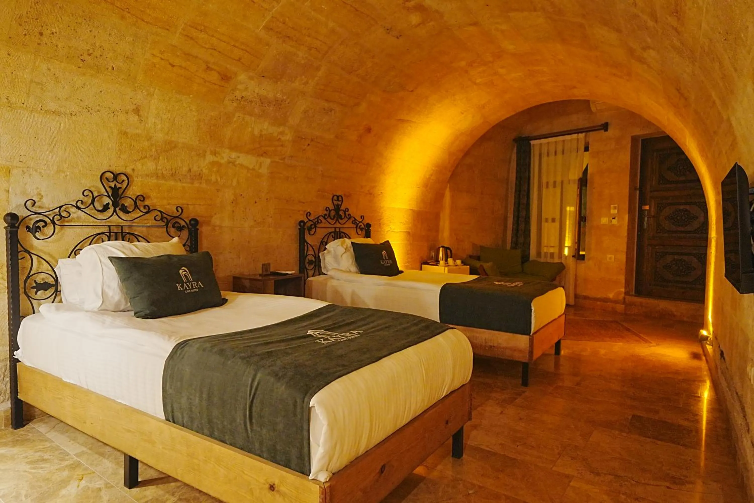 Bed in Kayra Cave Suites