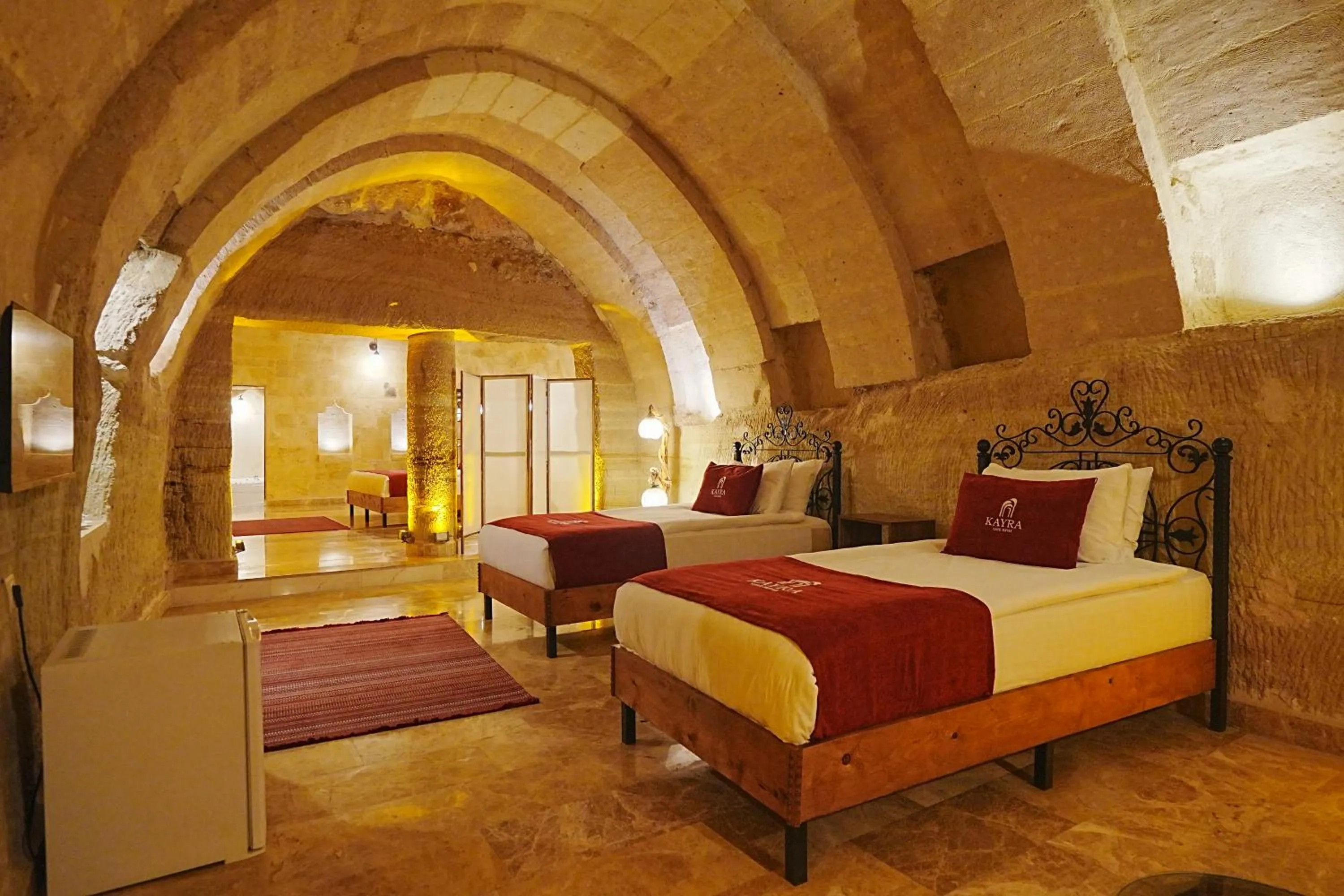 Bed in Kayra Cave Suites