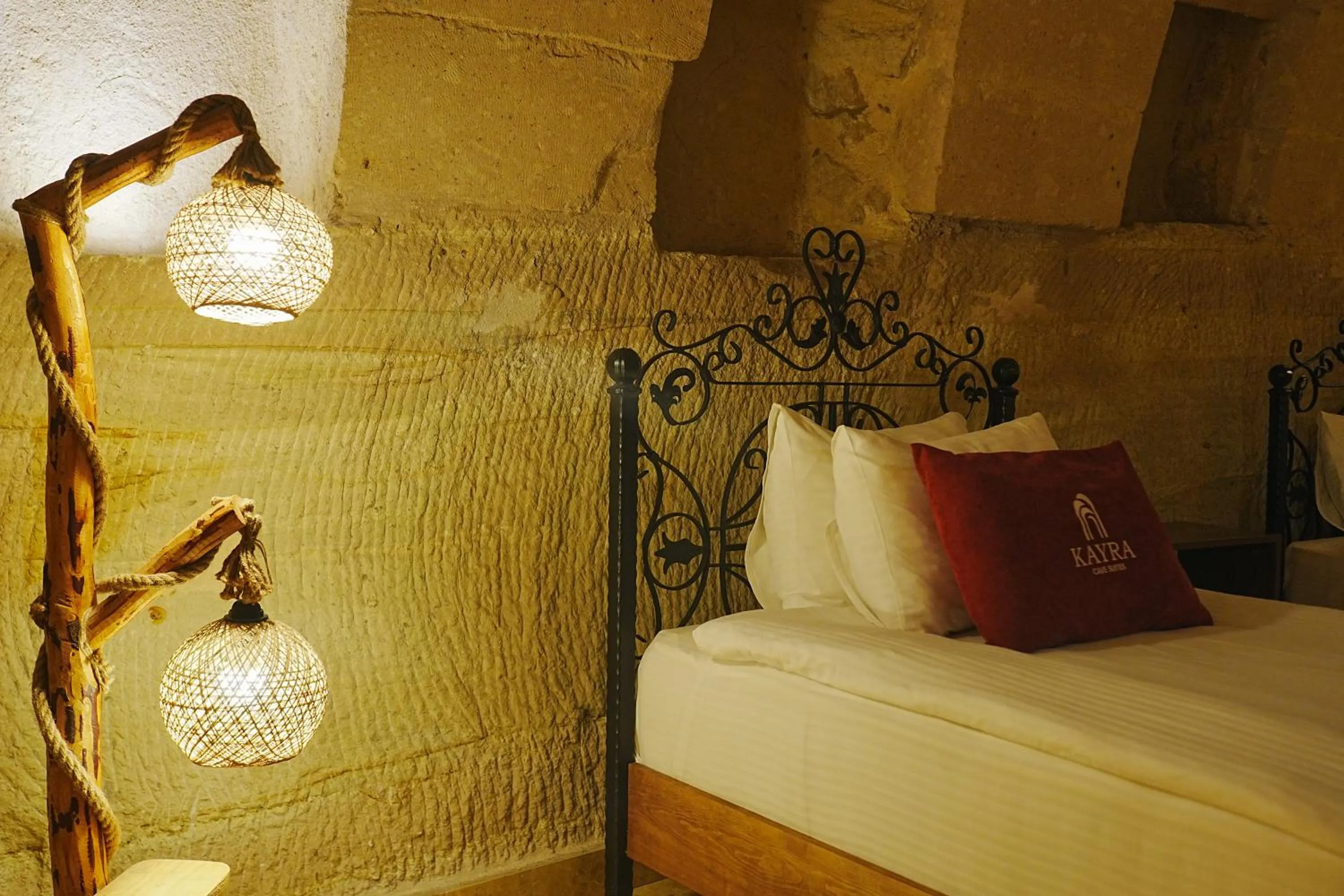 Bed in Kayra Cave Suites