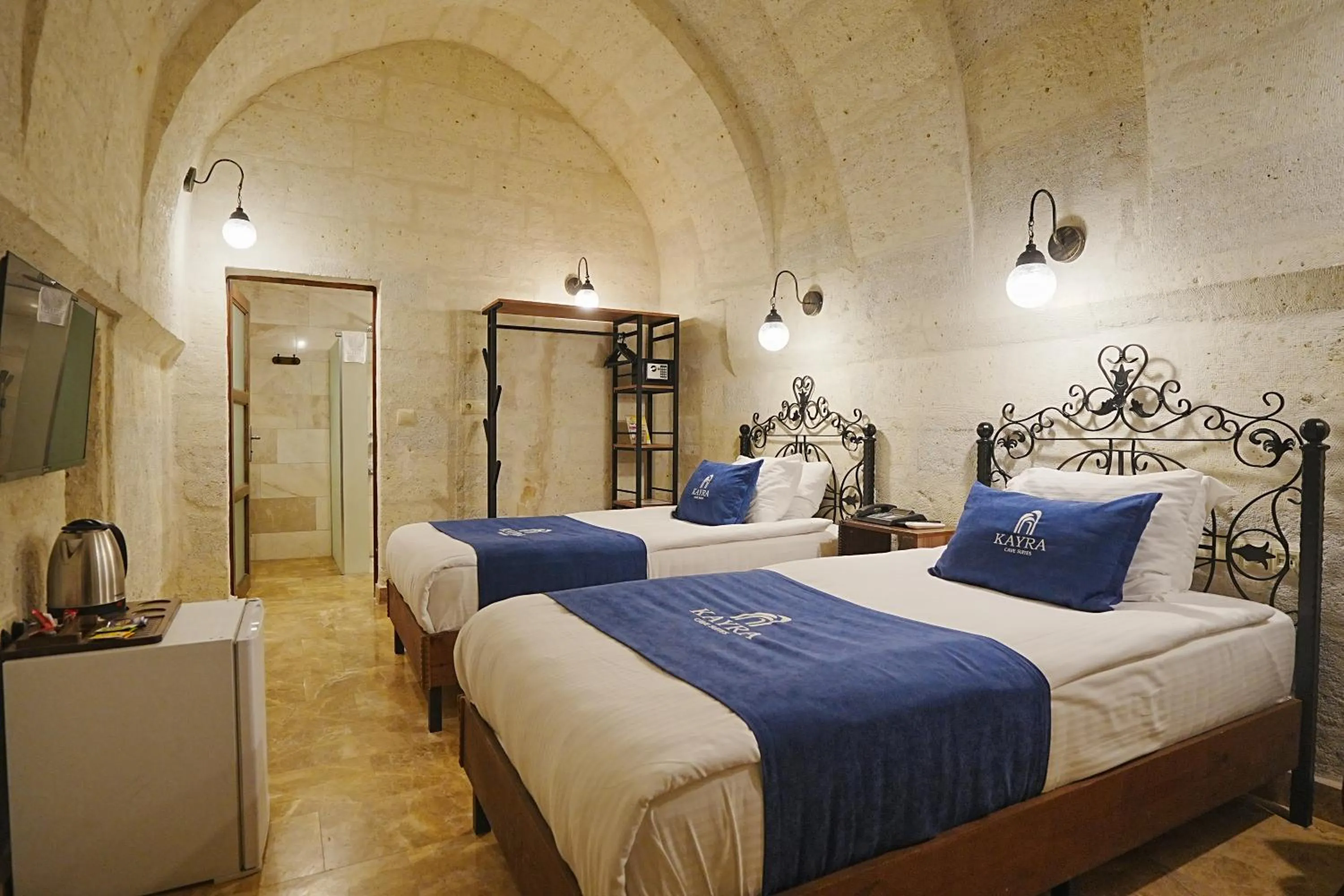 Bed in Kayra Cave Suites